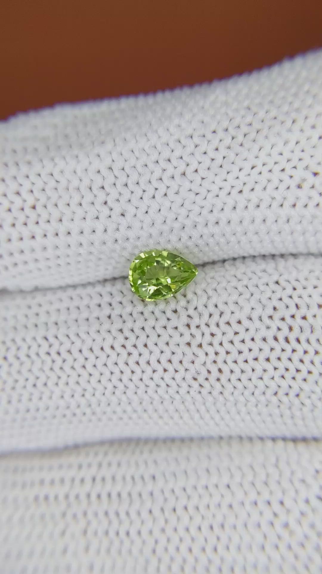 0.57 Ct. Yellowish Green Peridot from Pakistan Size Video