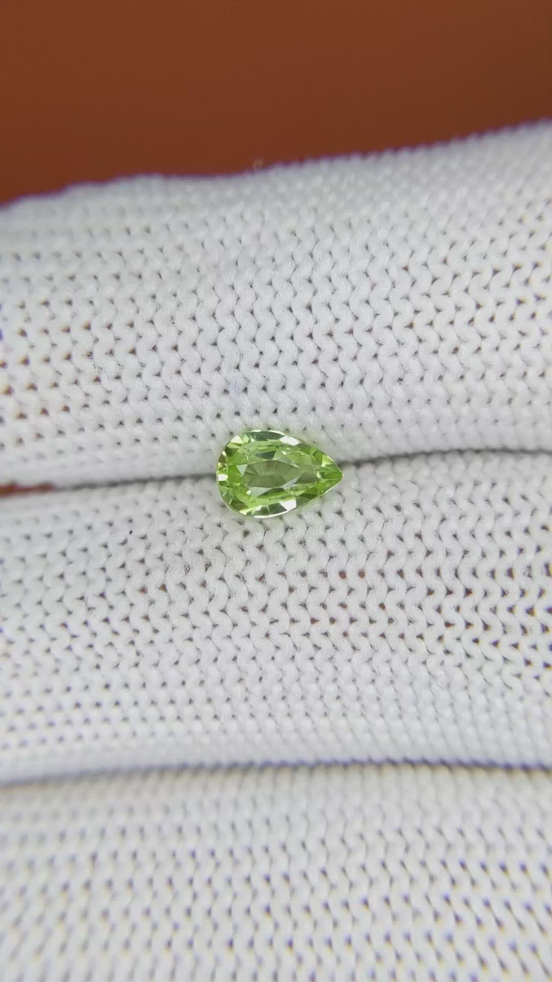 0.64 Ct. Yellowish Green Peridot from Pakistan Size Video