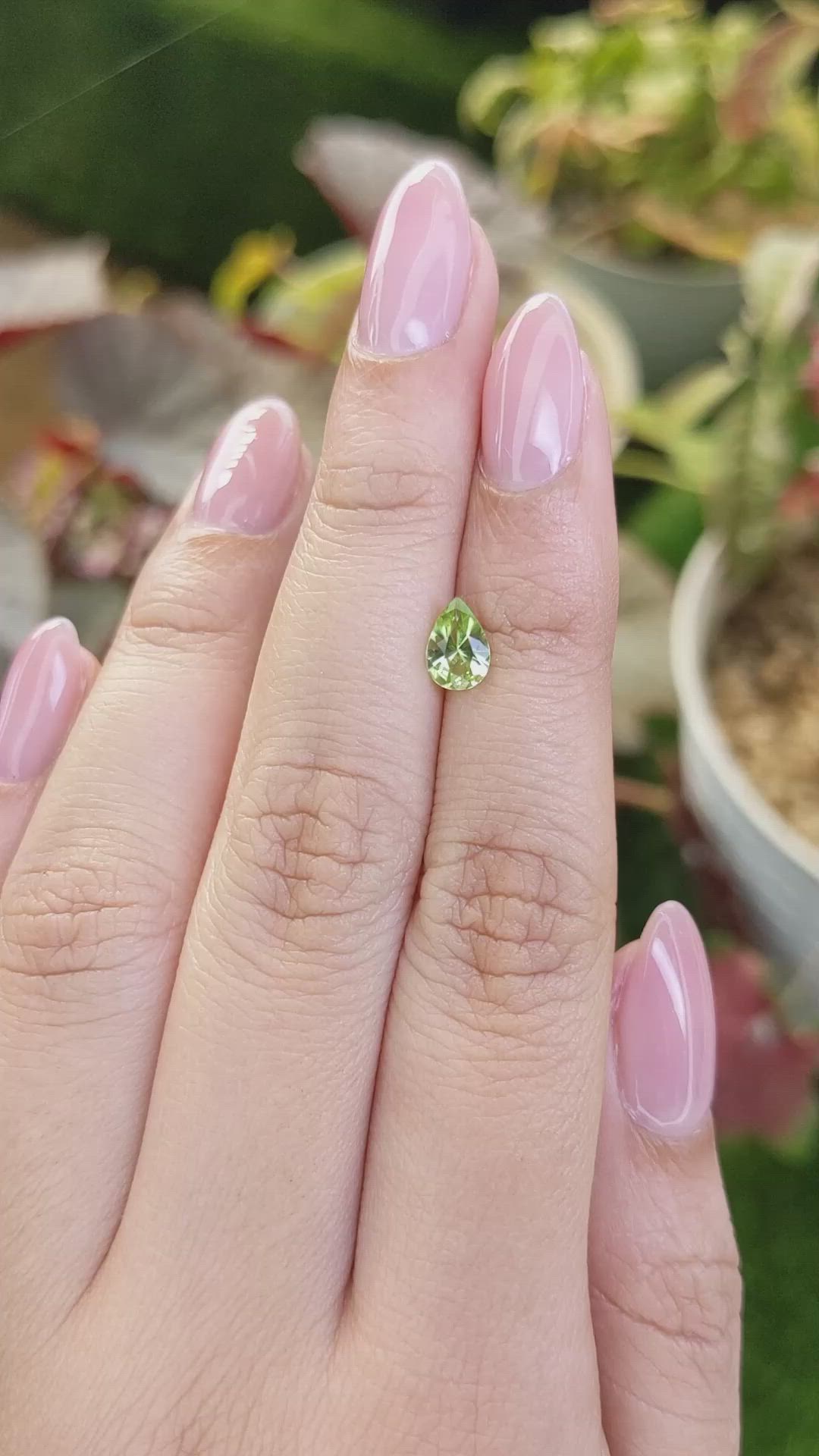 0.59 Ct. Green (Lime Green) Peridot from Pakistan Size Video