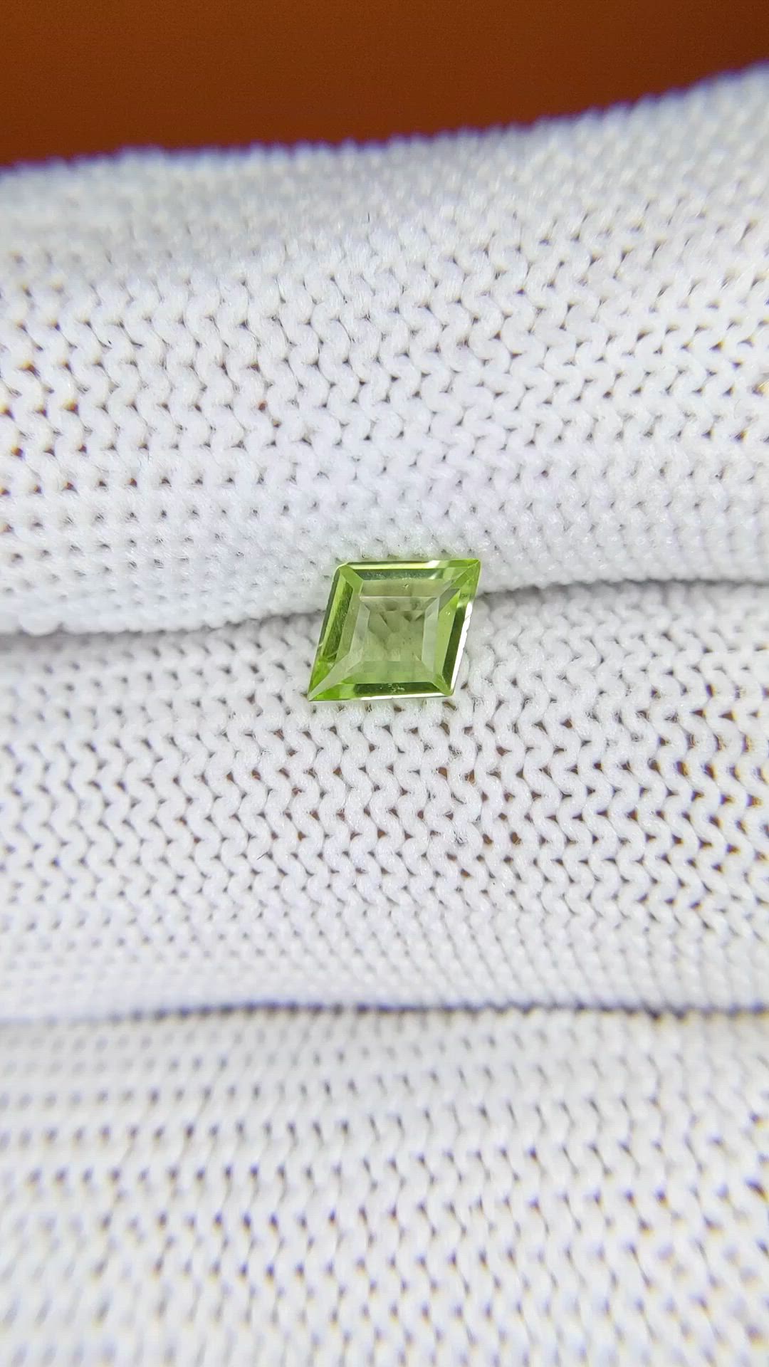 0.60 Ct. Yellowish Green Peridot from Pakistan Size Video