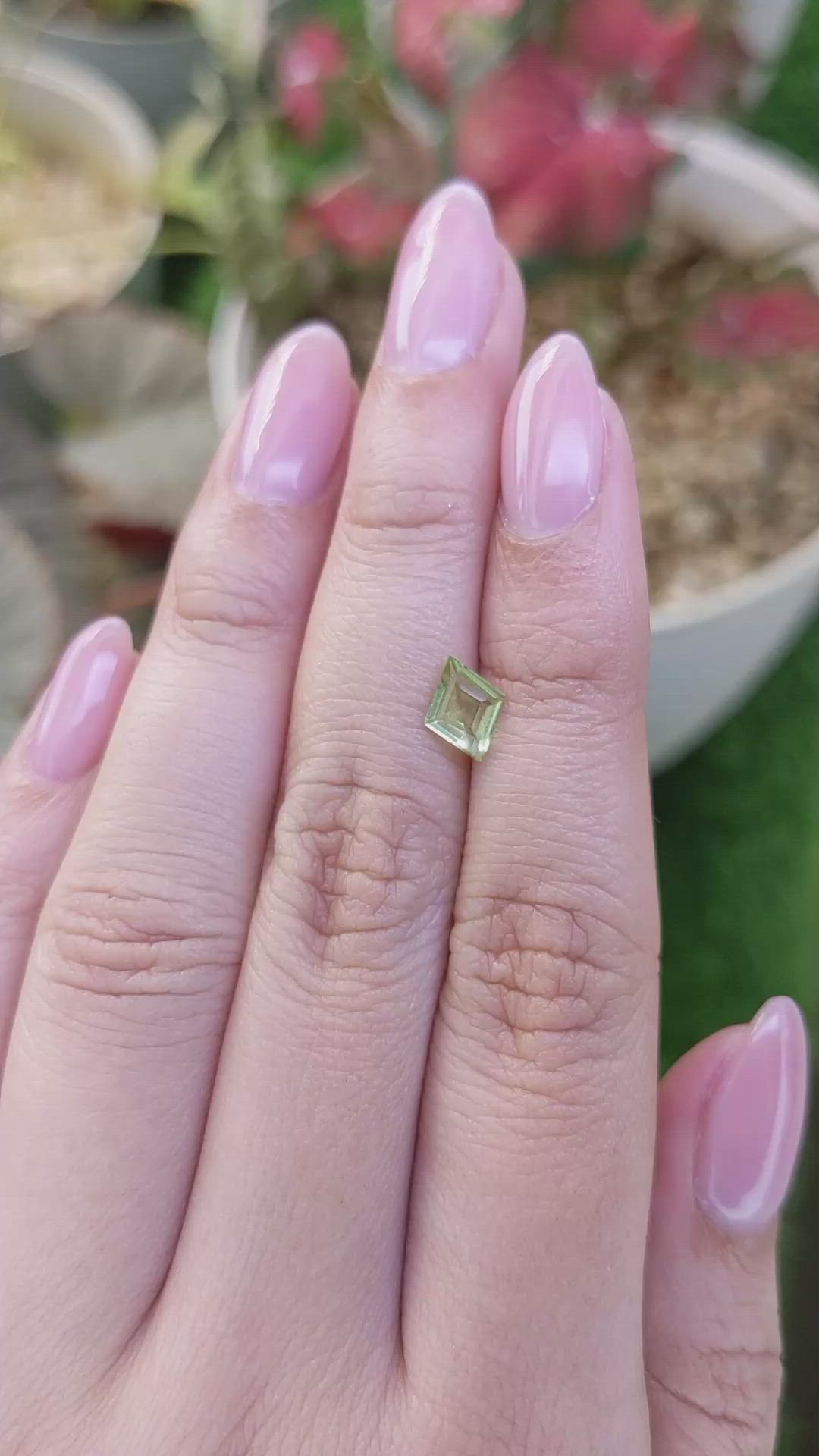0.60 Ct. Yellowish Green Peridot from Pakistan Size Video