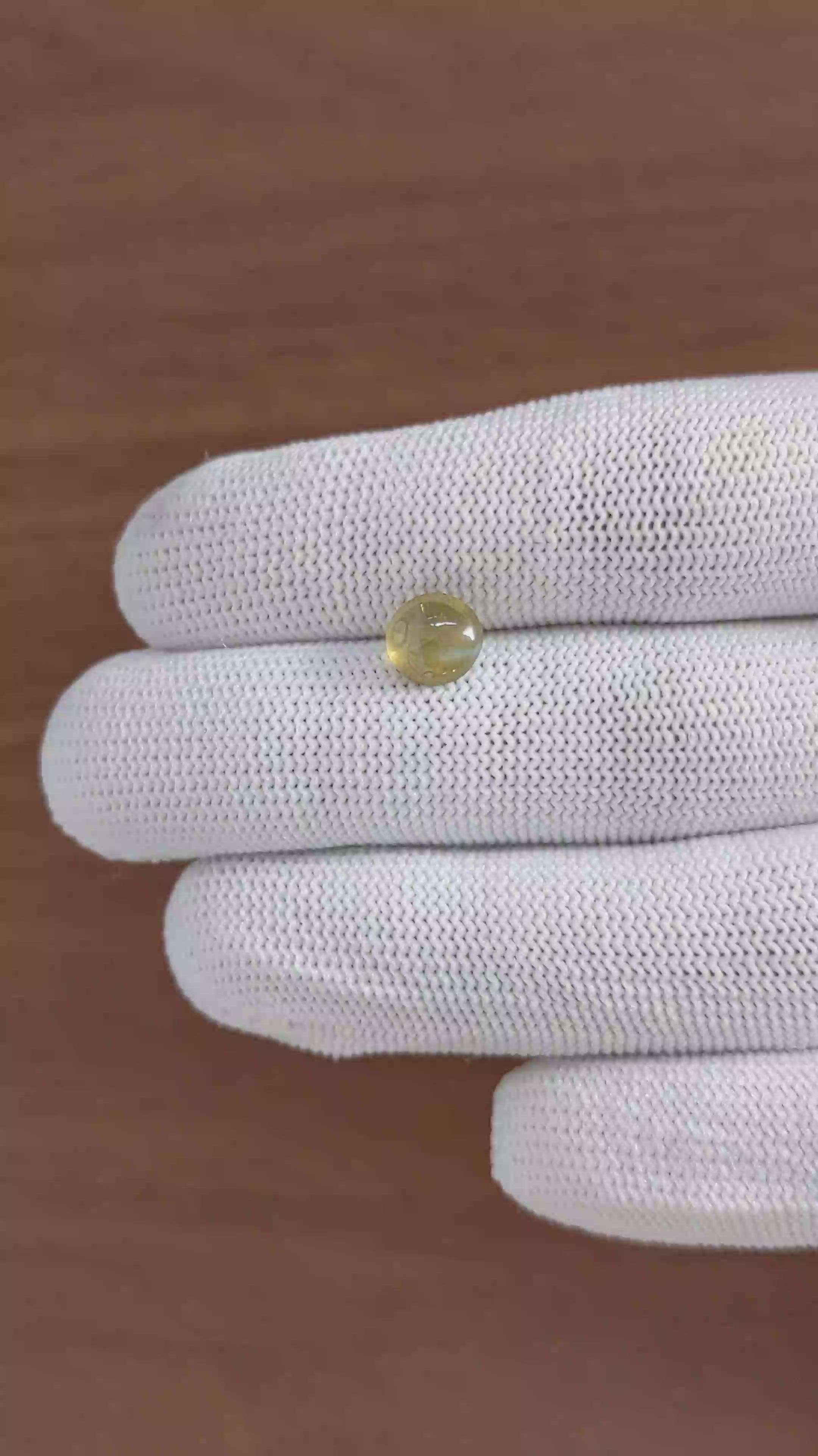 2.09 Ct. Yellowish Green Cabochon Chrysoberyl from Tanzania Size Video