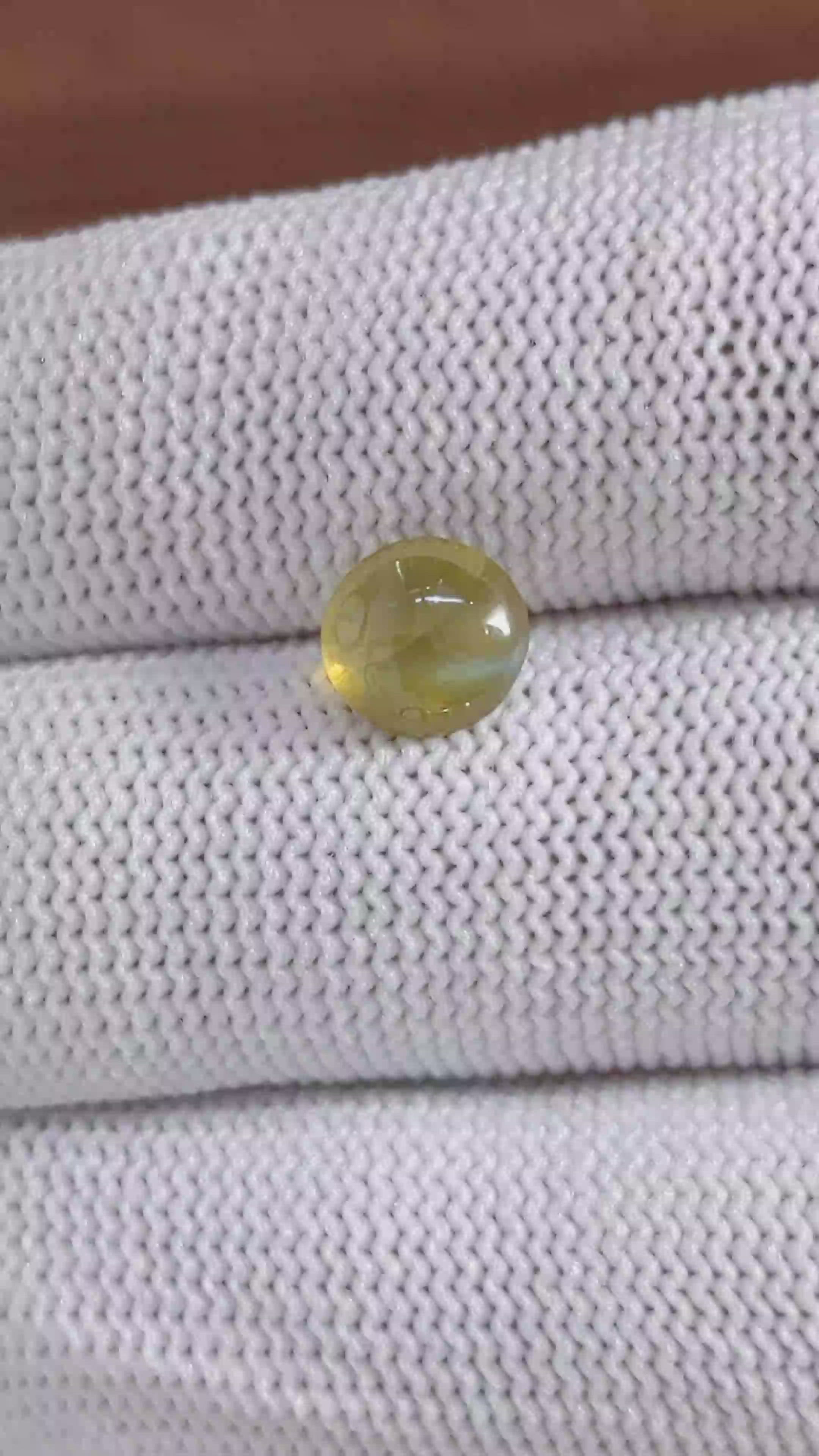 2.09 Ct. Yellowish Green Cabochon Chrysoberyl from Tanzania Size Video