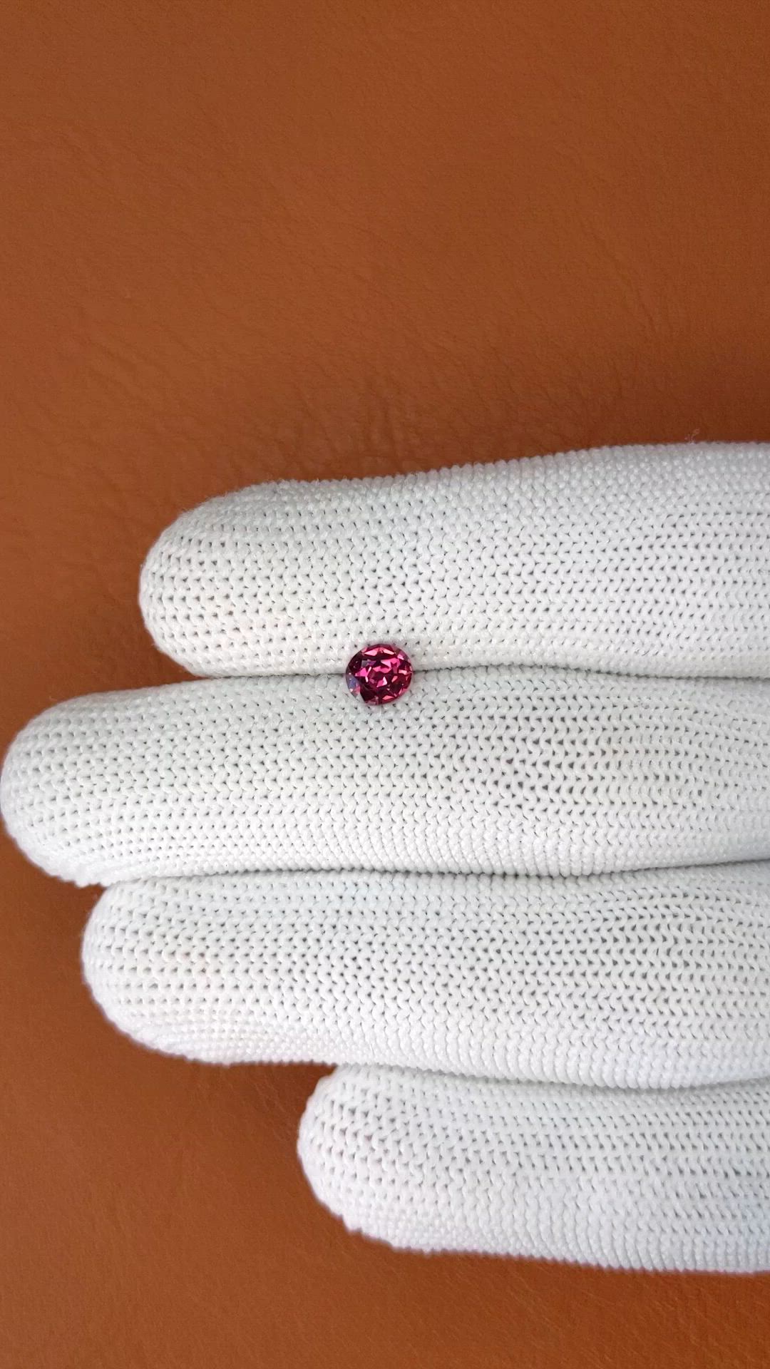 0.68 Ct. Purplish Pink Rhodolite Garnet from Ceylon (Sri Lanka) Size Video