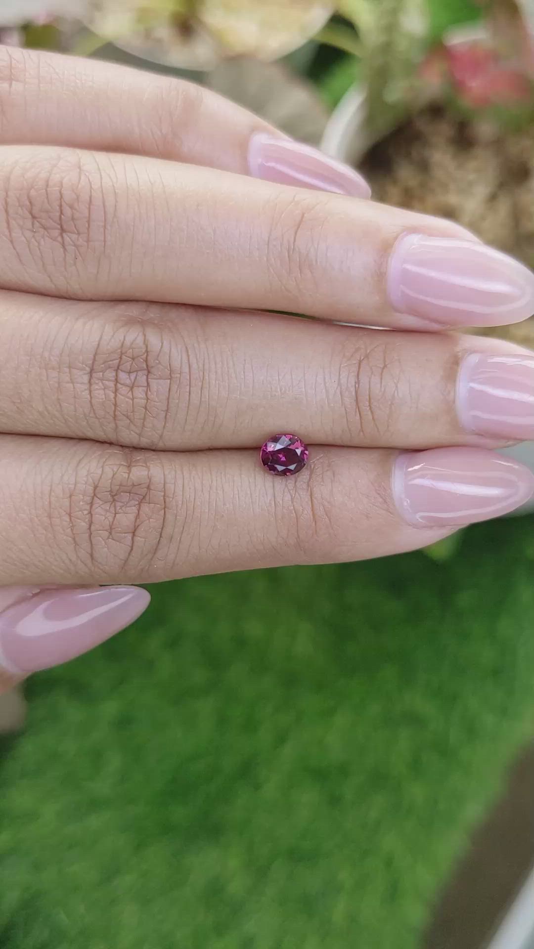 0.68 Ct. Purplish Pink Rhodolite Garnet from Ceylon (Sri Lanka) Size Video