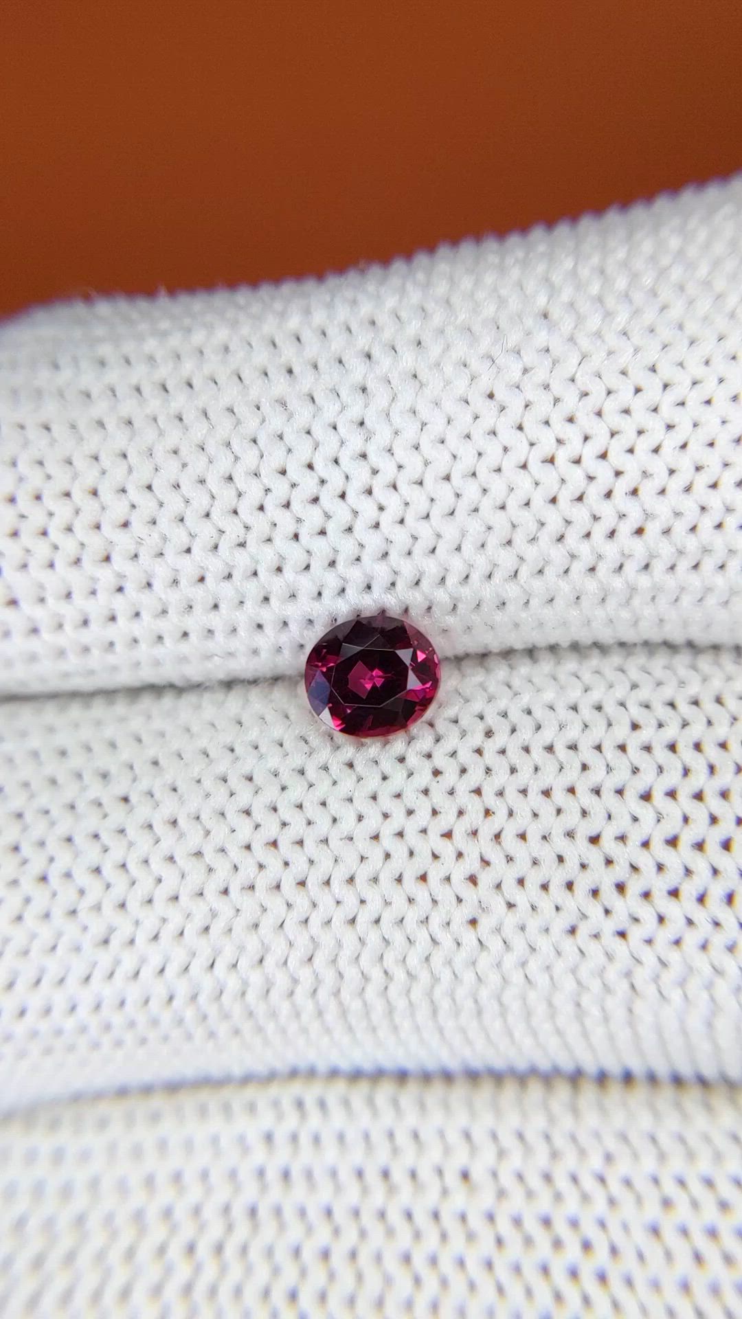 0.68 Ct. Purplish Pink Rhodolite Garnet from Ceylon (Sri Lanka) Size Video