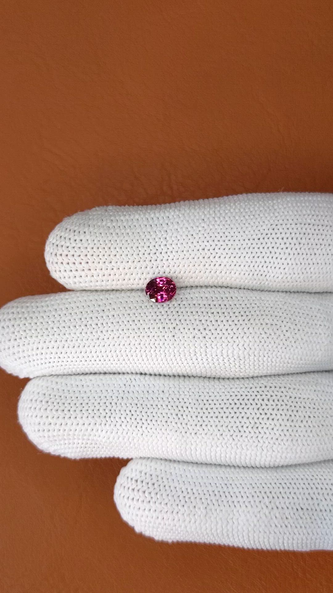 0.66 Ct. Purplish Pink Rhodolite Garnet from Ceylon (Sri Lanka) Size Video