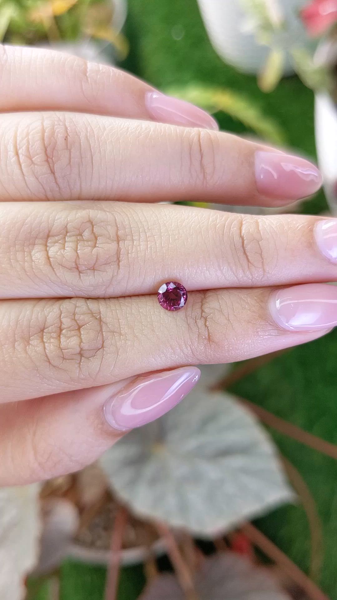0.65 Ct. Purplish Pink Rhodolite Garnet from Ceylon (Sri Lanka) Size Video