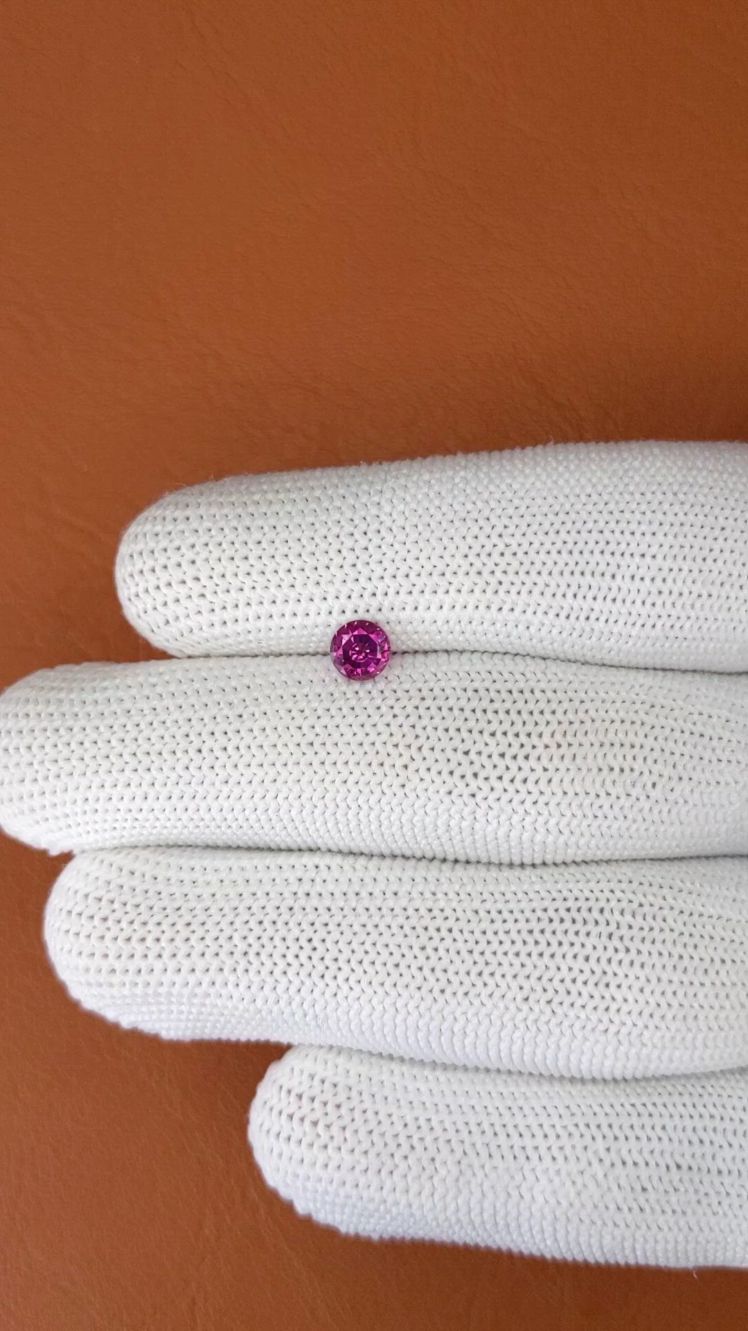 0.65 Ct. Purplish Pink Rhodolite Garnet from Ceylon (Sri Lanka) Size Video