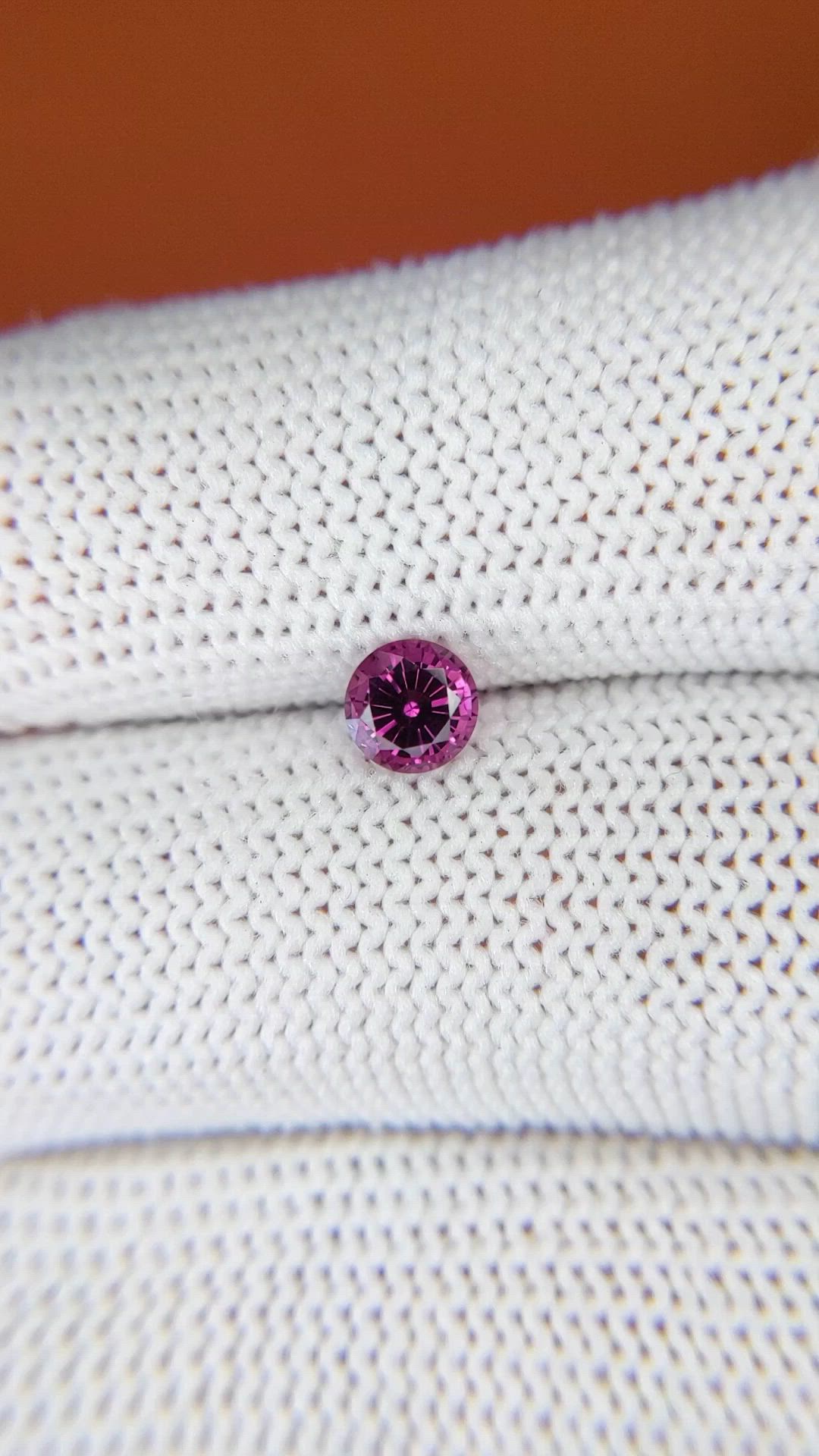 0.65 Ct. Purplish Pink Rhodolite Garnet from Ceylon (Sri Lanka) Size Video