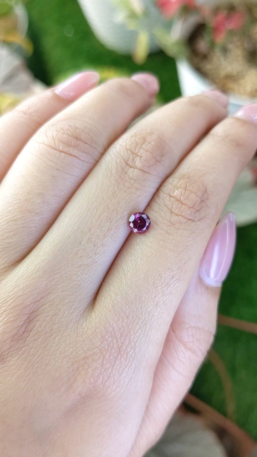 0.65 Ct. Purplish Pink Rhodolite Garnet from Ceylon (Sri Lanka) Size Video