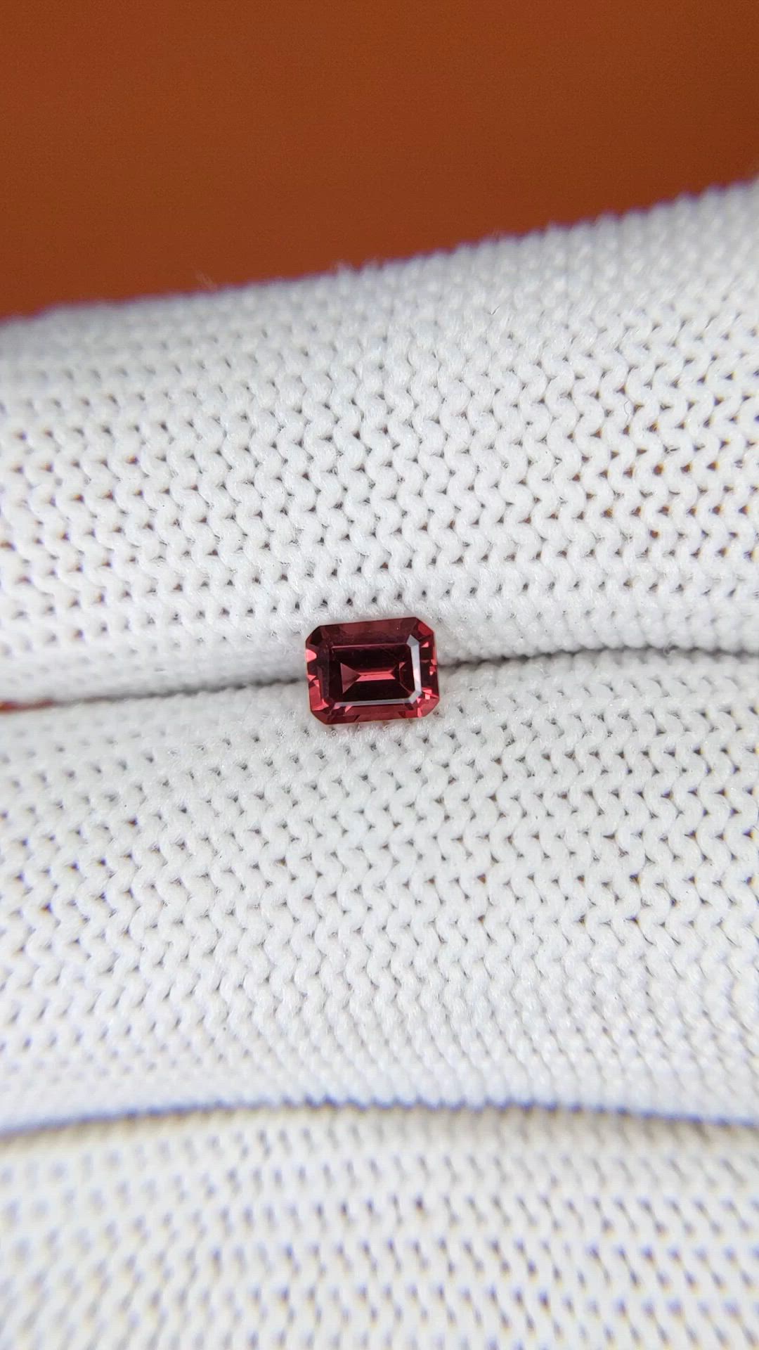 0.59 Ct. Orangish Red Garnet from Ceylon (Sri Lanka) Size Video