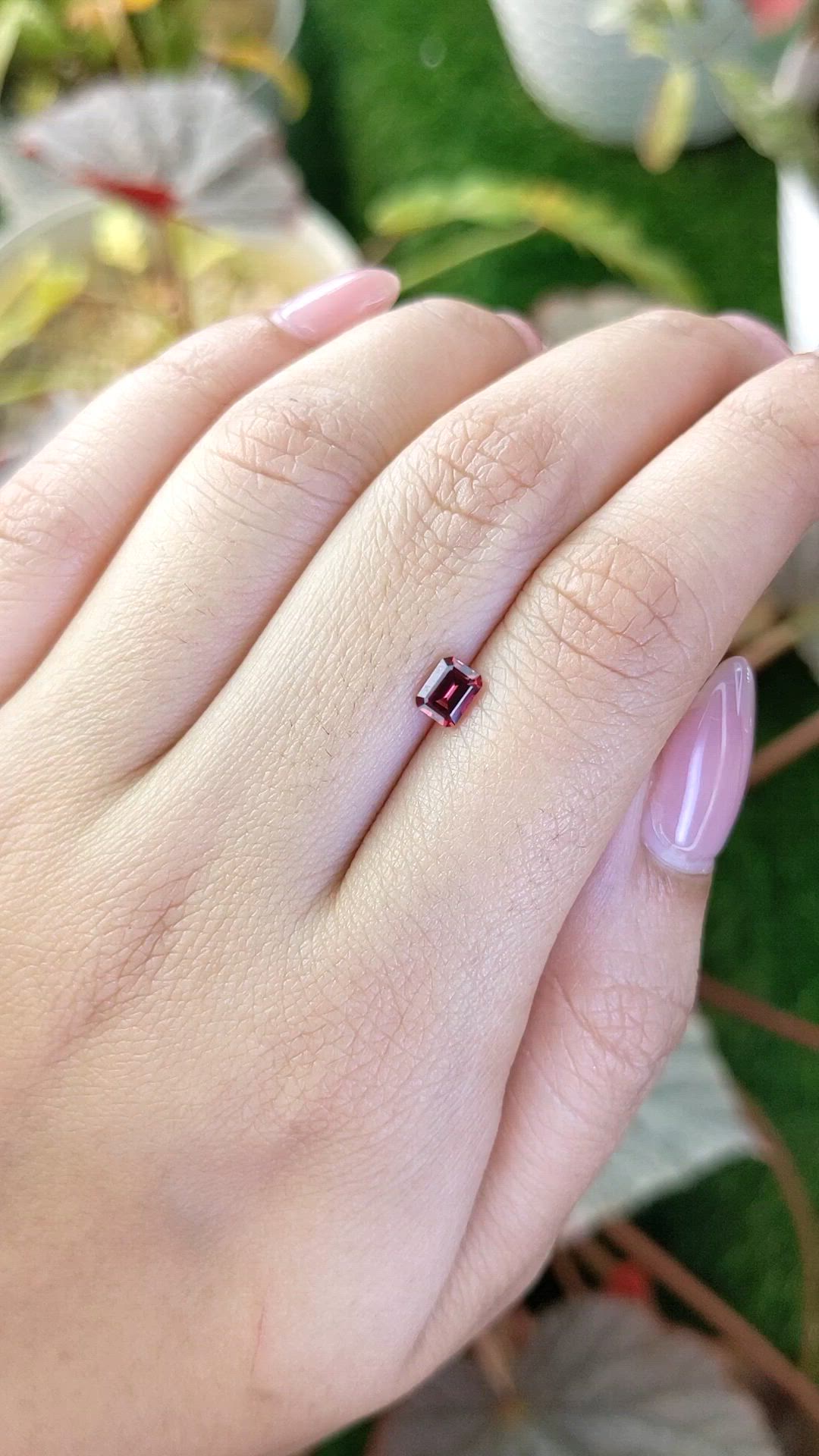 0.59 Ct. Orangish Red Garnet from Ceylon (Sri Lanka) Size Video