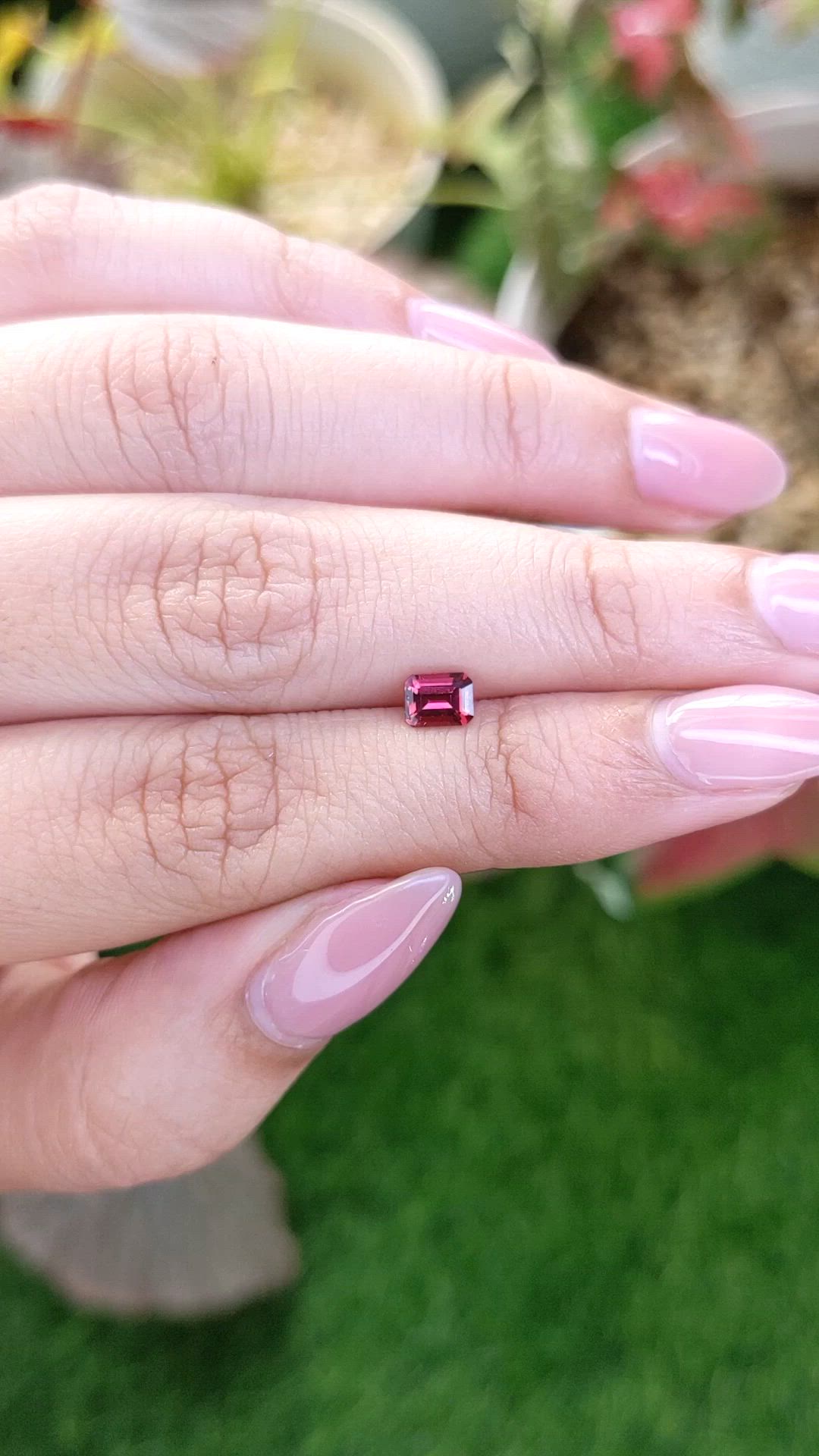 0.59 Ct. Orangish Red Garnet from Ceylon (Sri Lanka) Size Video