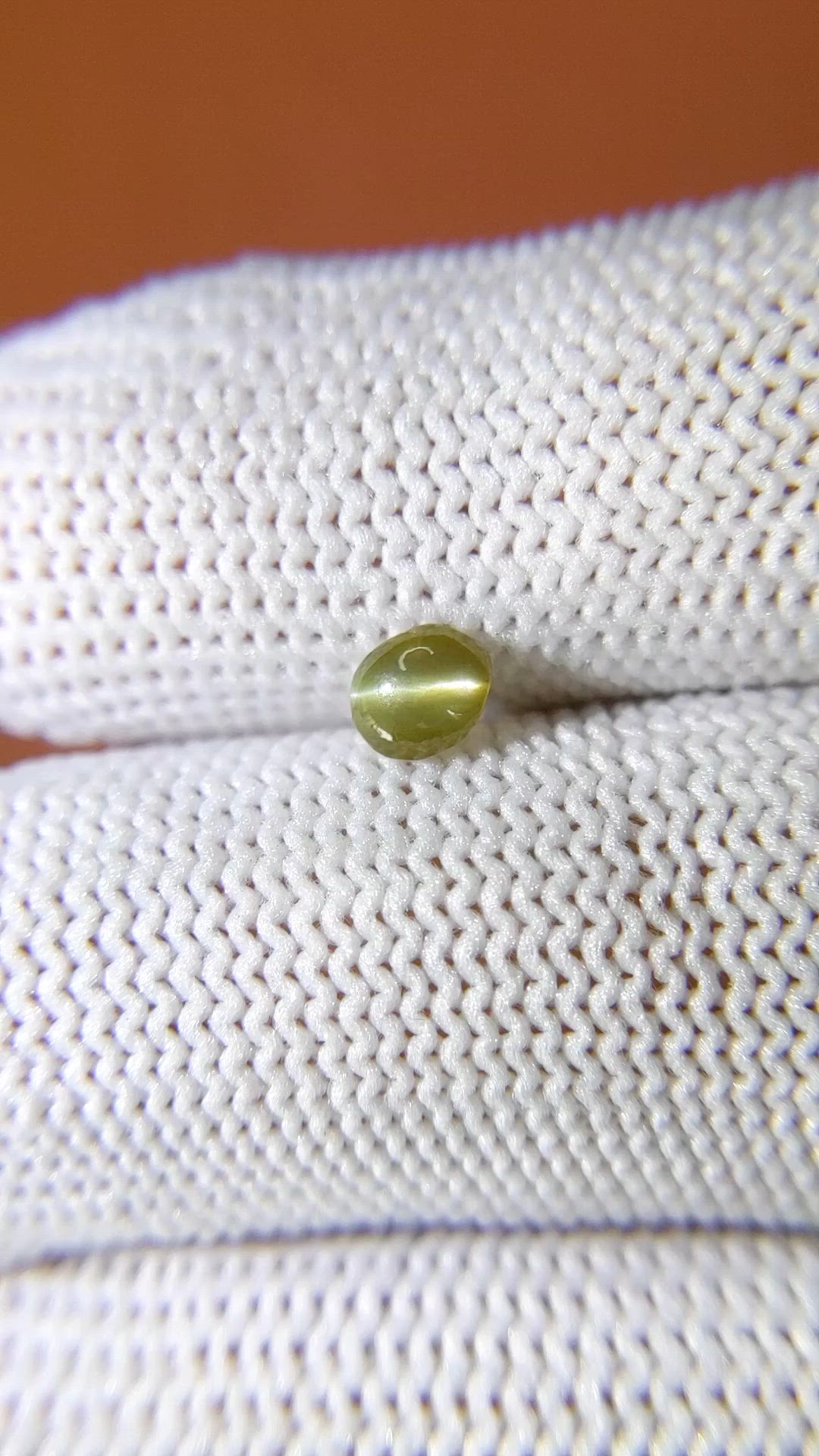 0.52 Ct. Yellowish Green Cabochon Chrysoberyl from Ceylon (Sri Lanka) Size Video