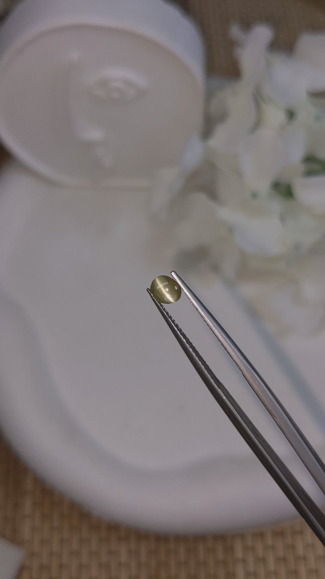 0.52 Ct. Yellowish Green Cabochon Chrysoberyl from Ceylon (Sri Lanka) Size Video