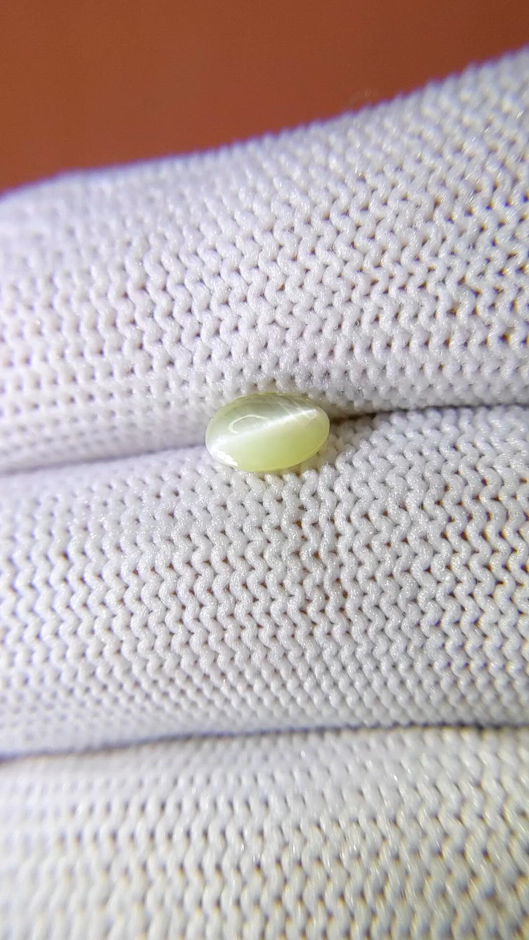 0.83 Ct. Yellowish Green Cabochon Chrysoberyl from Ceylon (Sri Lanka) Size Video