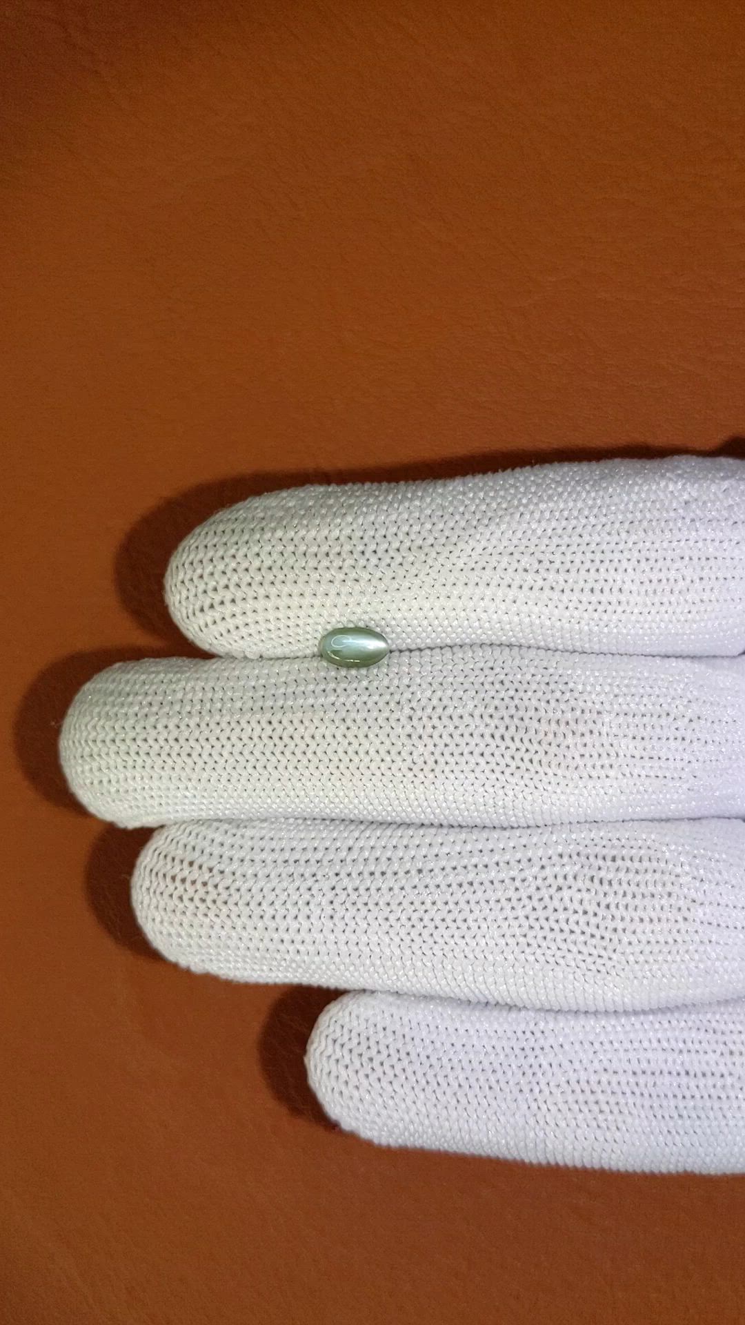 0.64 Ct. Green Cabochon Chrysoberyl from Ceylon (Sri Lanka) Size Video