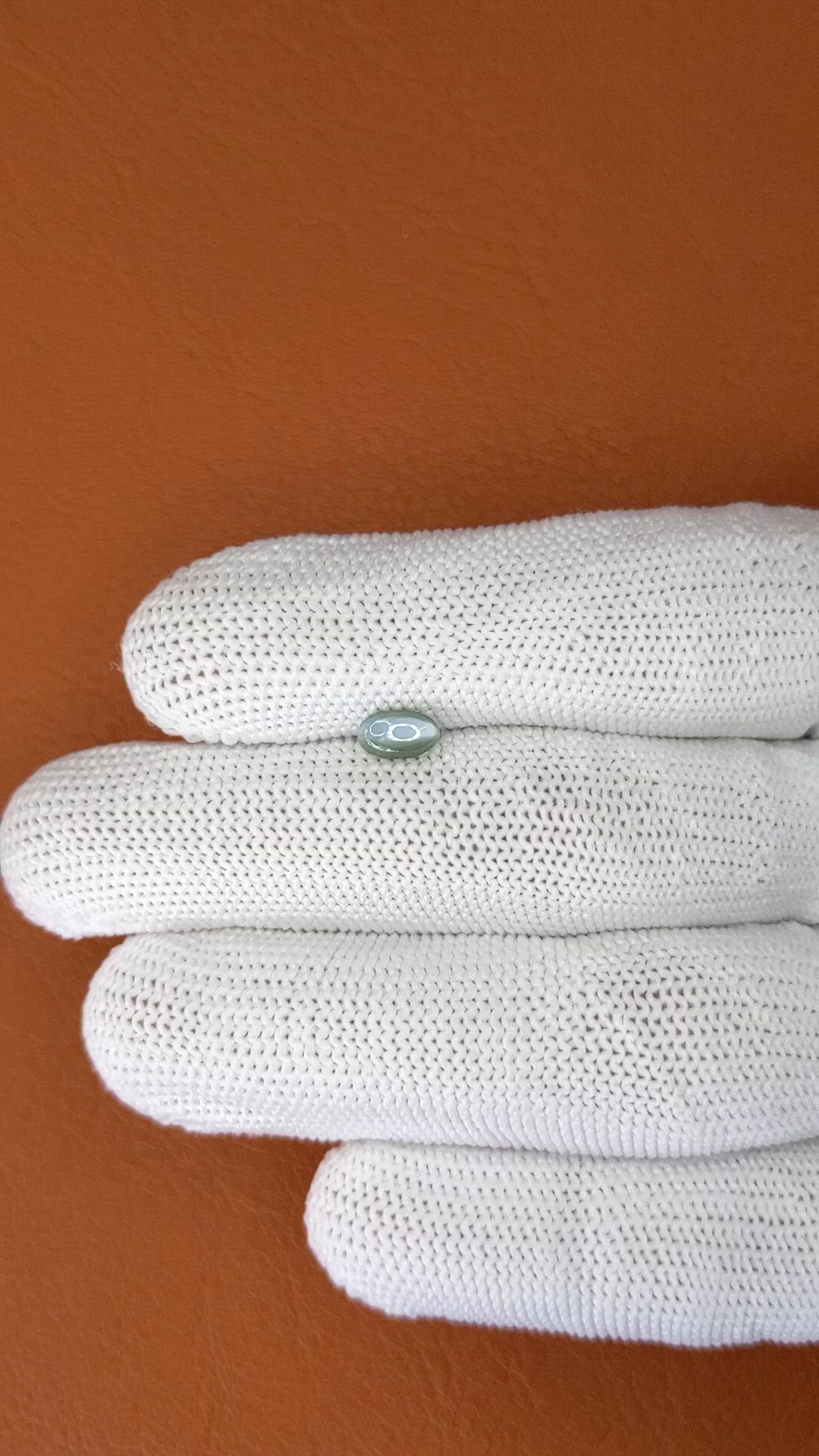 0.64 Ct. Green Cabochon Chrysoberyl from Ceylon (Sri Lanka) Size Video