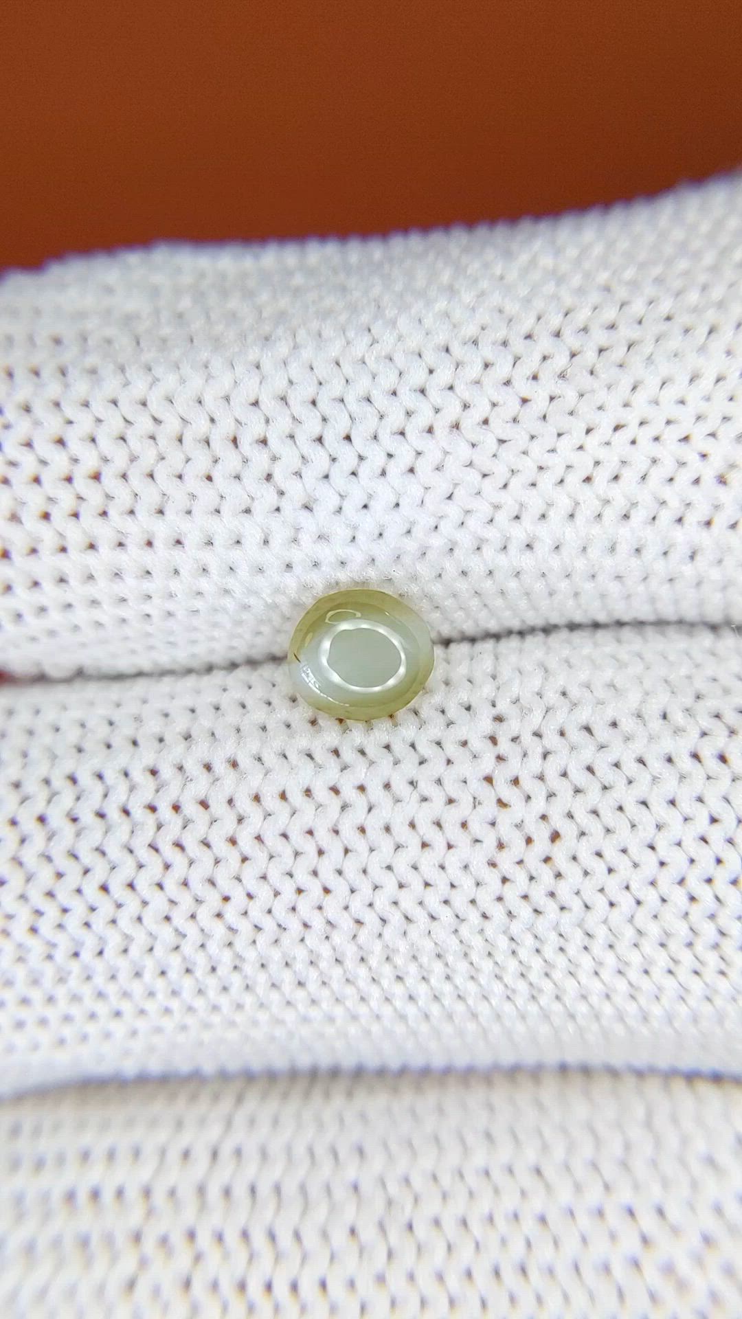 0.82 Ct. Yellowish Green Cabochon Chrysoberyl from Ceylon (Sri Lanka) Size Video