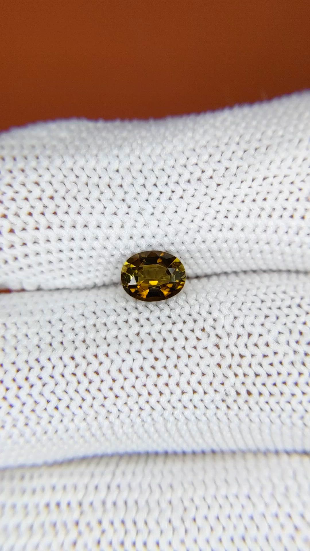 0.65 Ct. Yellowish Brown Zircon from Ceylon (Sri Lanka) Size Video