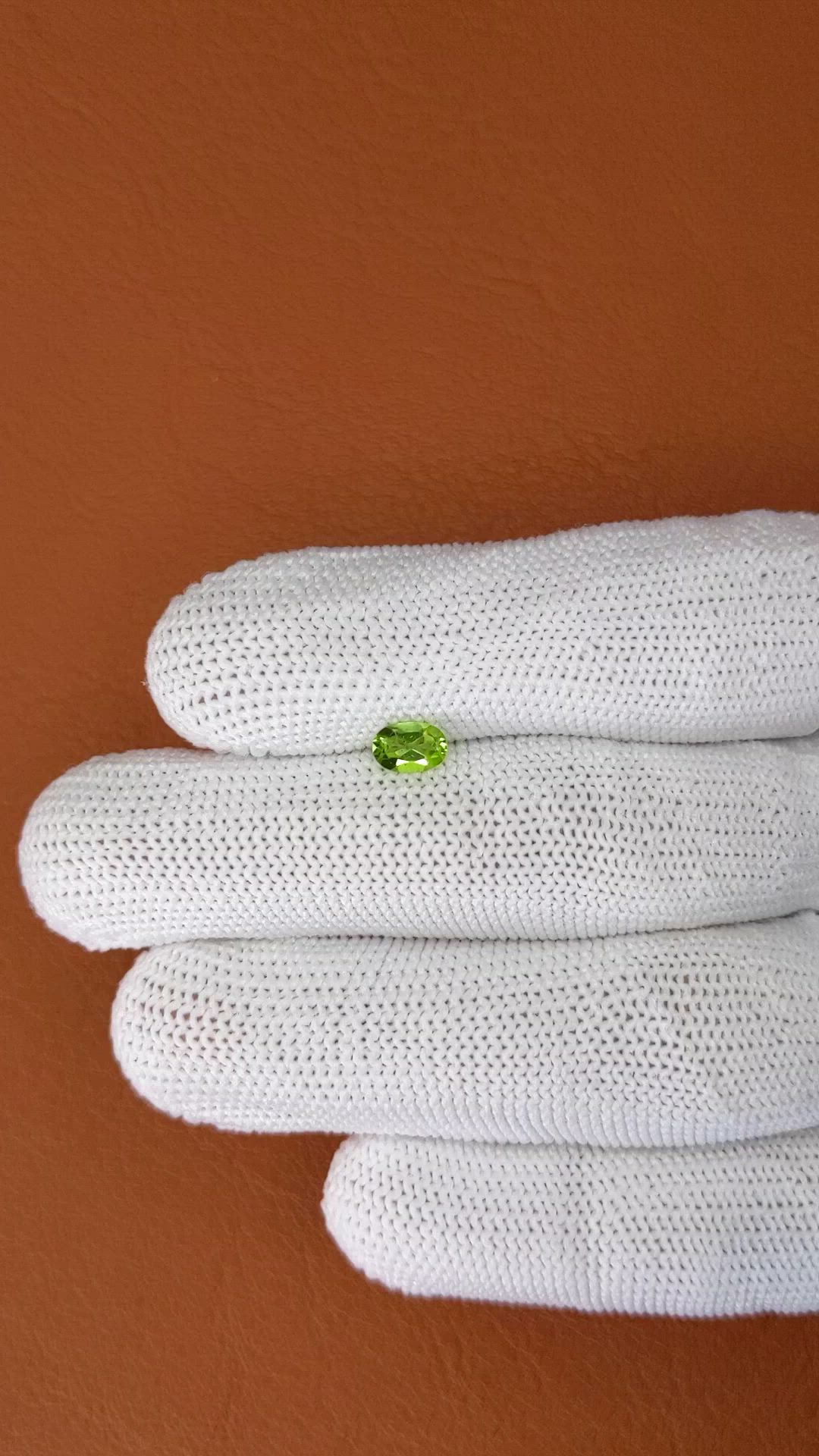 0.54 Ct. Yellowish Green Peridot from Pakistan Size Video