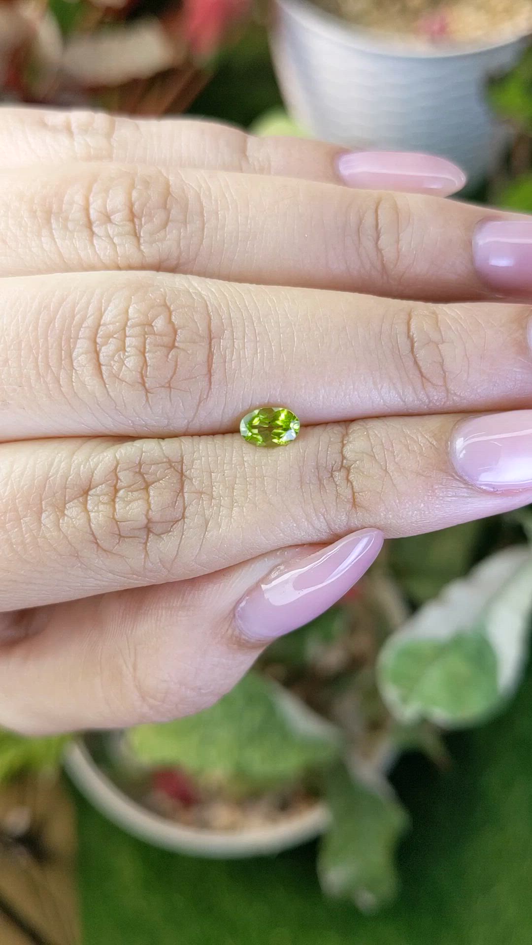 0.49 Ct. Yellowish Green Peridot from Pakistan Size Video