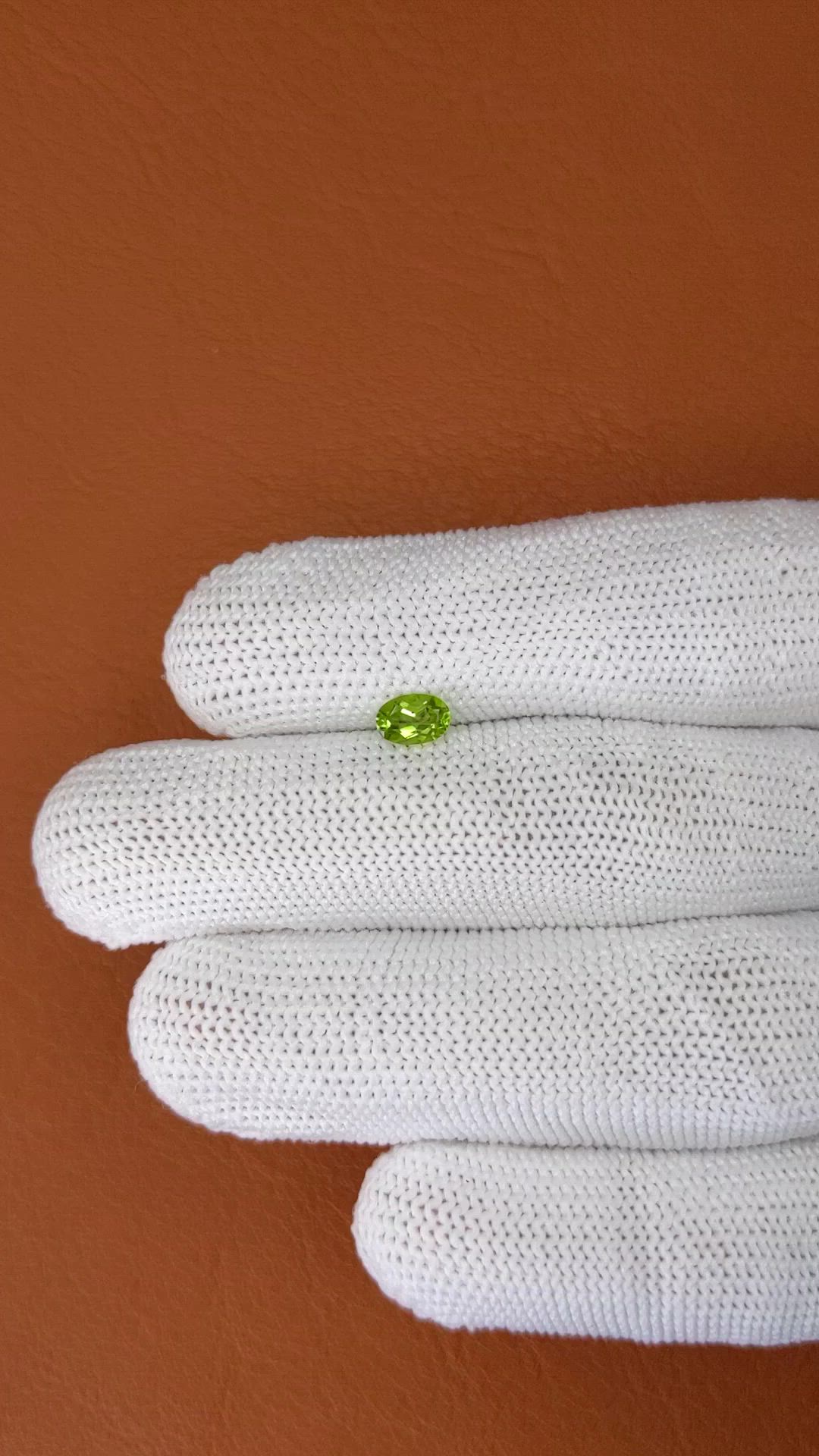 0.49 Ct. Yellowish Green Peridot from Pakistan Size Video