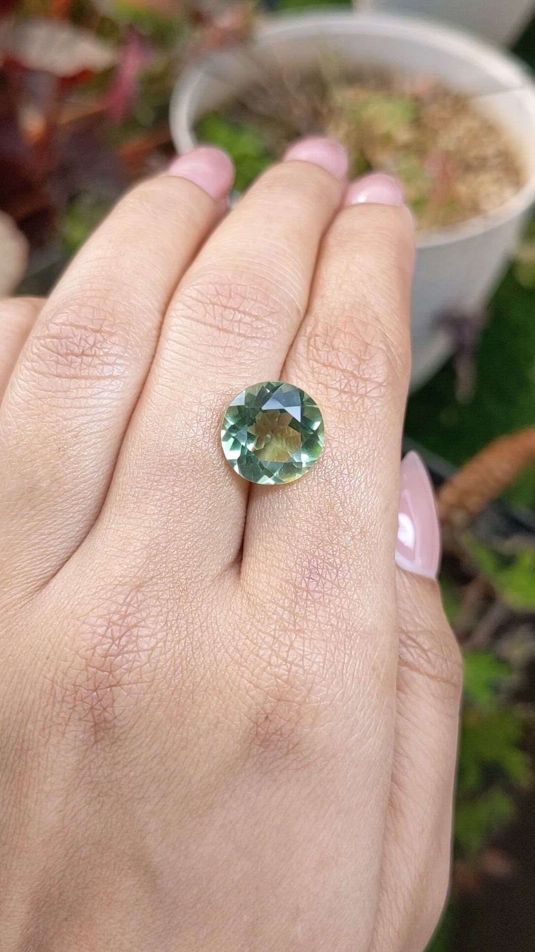 6.11 Ct. Yellowish Green Prasiolite from Brazil Size Video