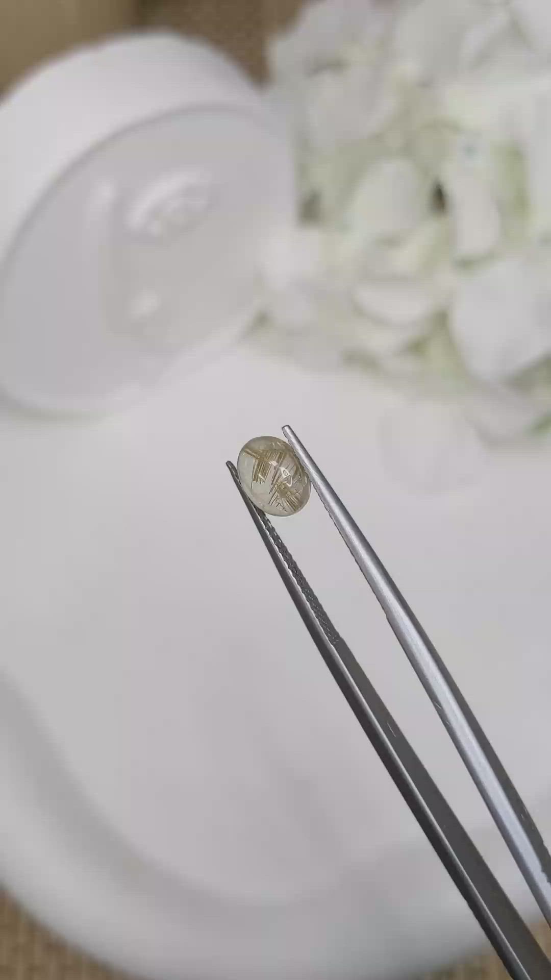 1.46 Ct. Brown Cabochon Rutilated Quartz from Brazil Size Video