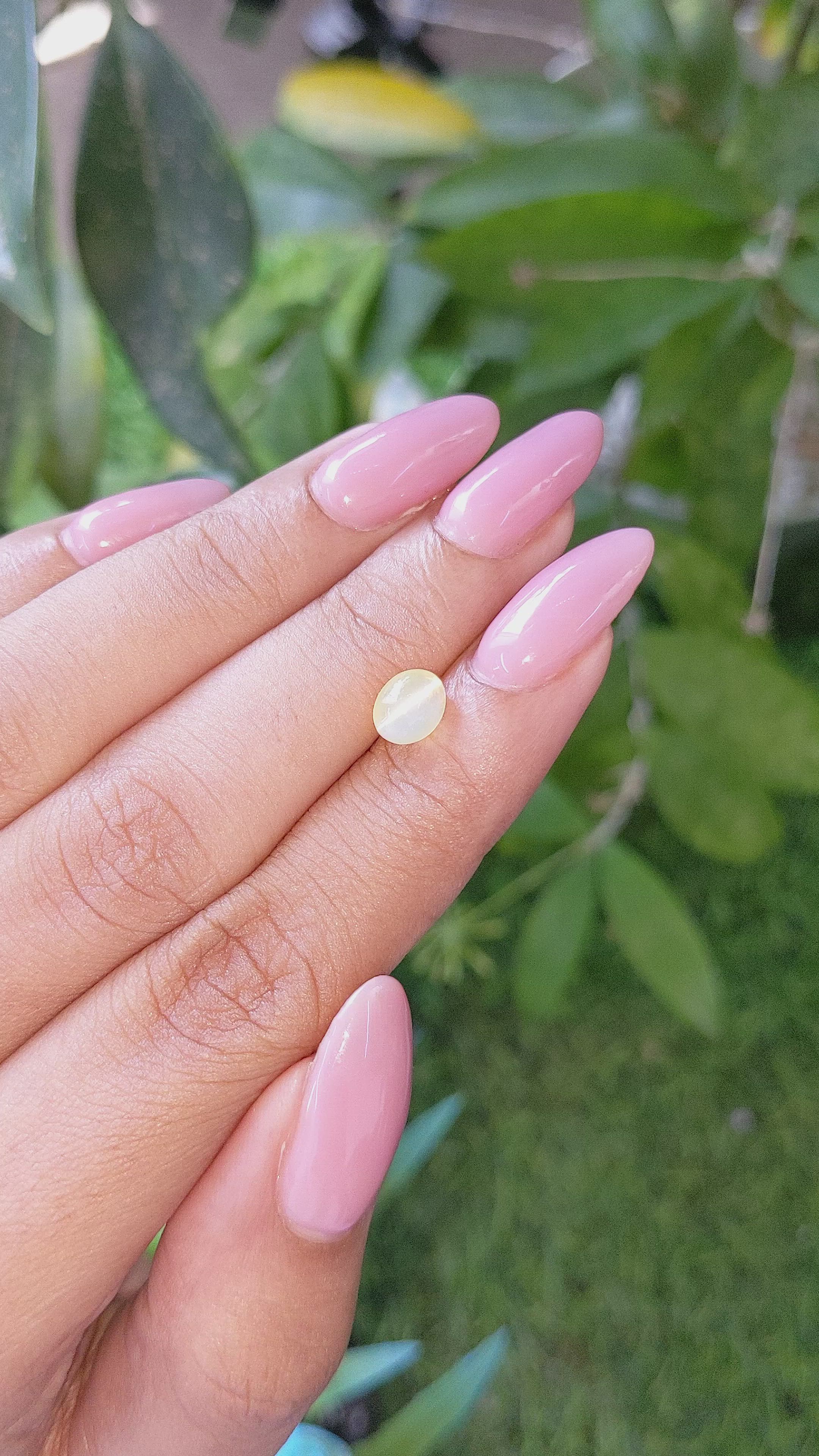 1.61 Ct. Greenish Yellow Cabochon Chrysoberyl from Tanzania Size Video