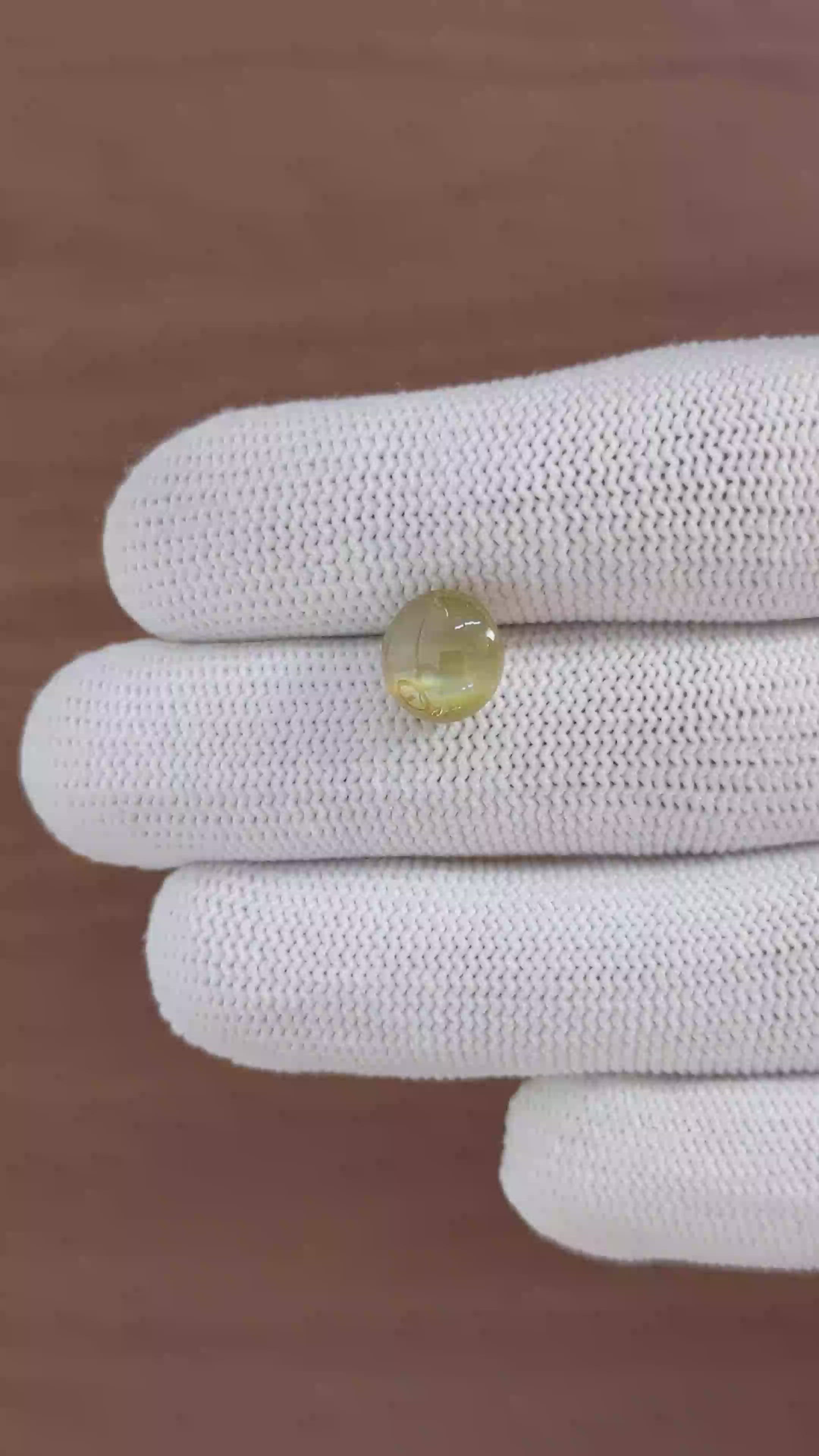 5.07 Ct. Greenish Brown Cabochon Chrysoberyl from Tanzania Size Video