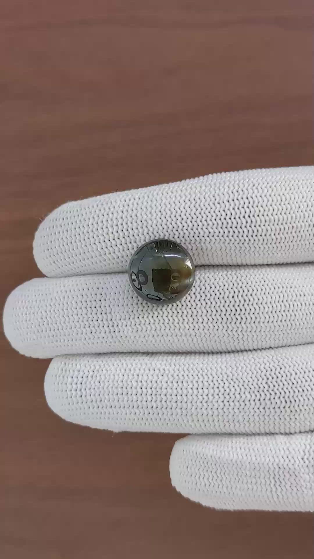 11.54 Ct. Brownish Green Cabochon Chrysoberyl from Ceylon (Sri Lanka) Size Video