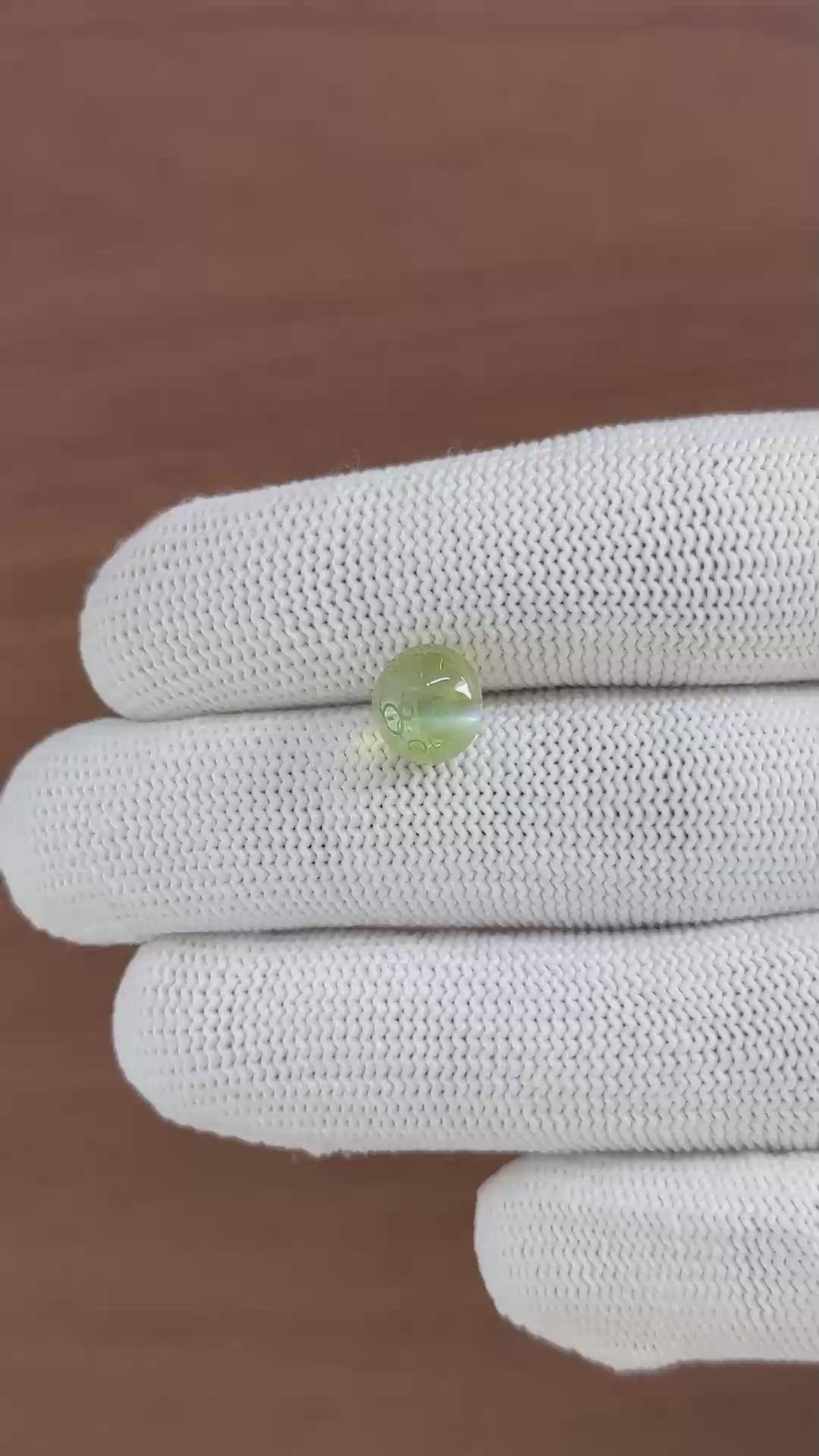 4.52 Ct. Yellowish Green Cabochon Chrysoberyl from Ceylon (Sri Lanka) Size Video