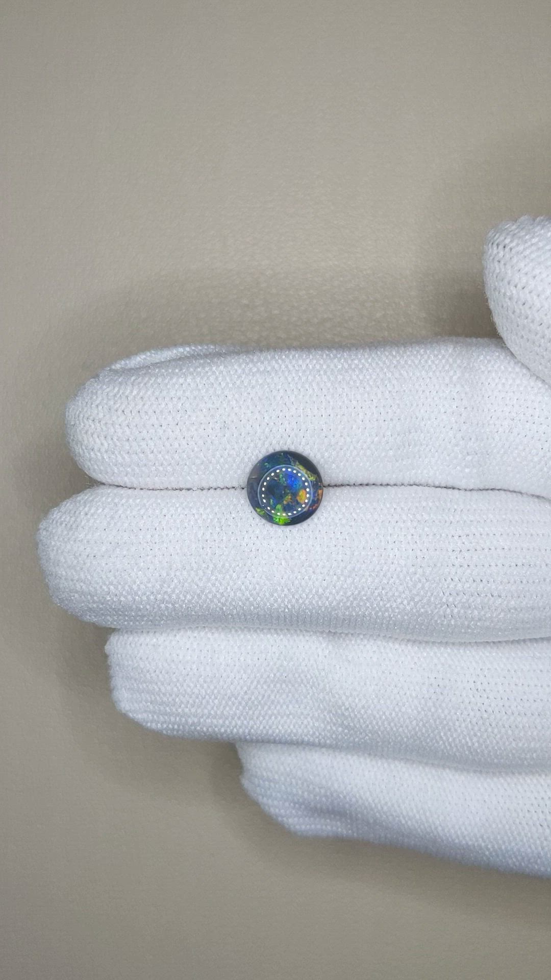 0.62 Ct. Multi Color Cabochon Black Opal (Dark Opal) from Australia Size Video