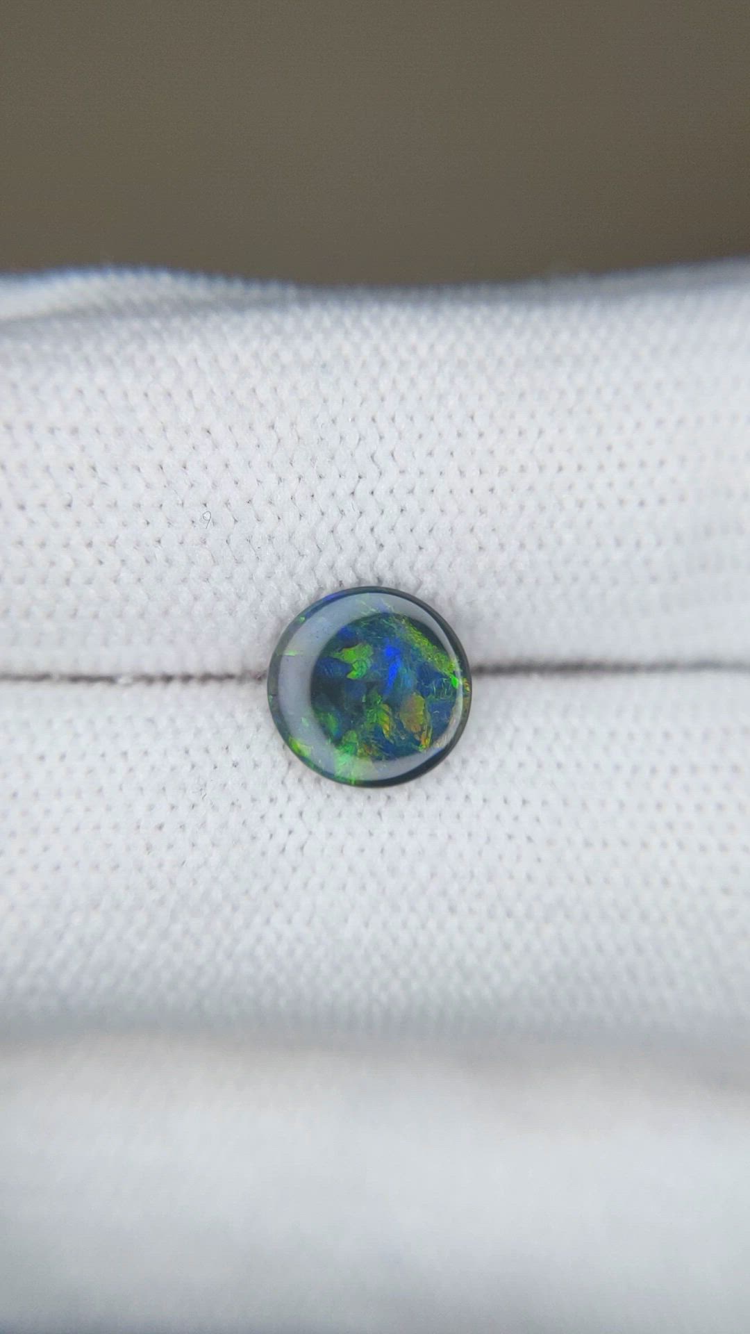 0.62 Ct. Multi Color Cabochon Black Opal (Dark Opal) from Australia Size Video