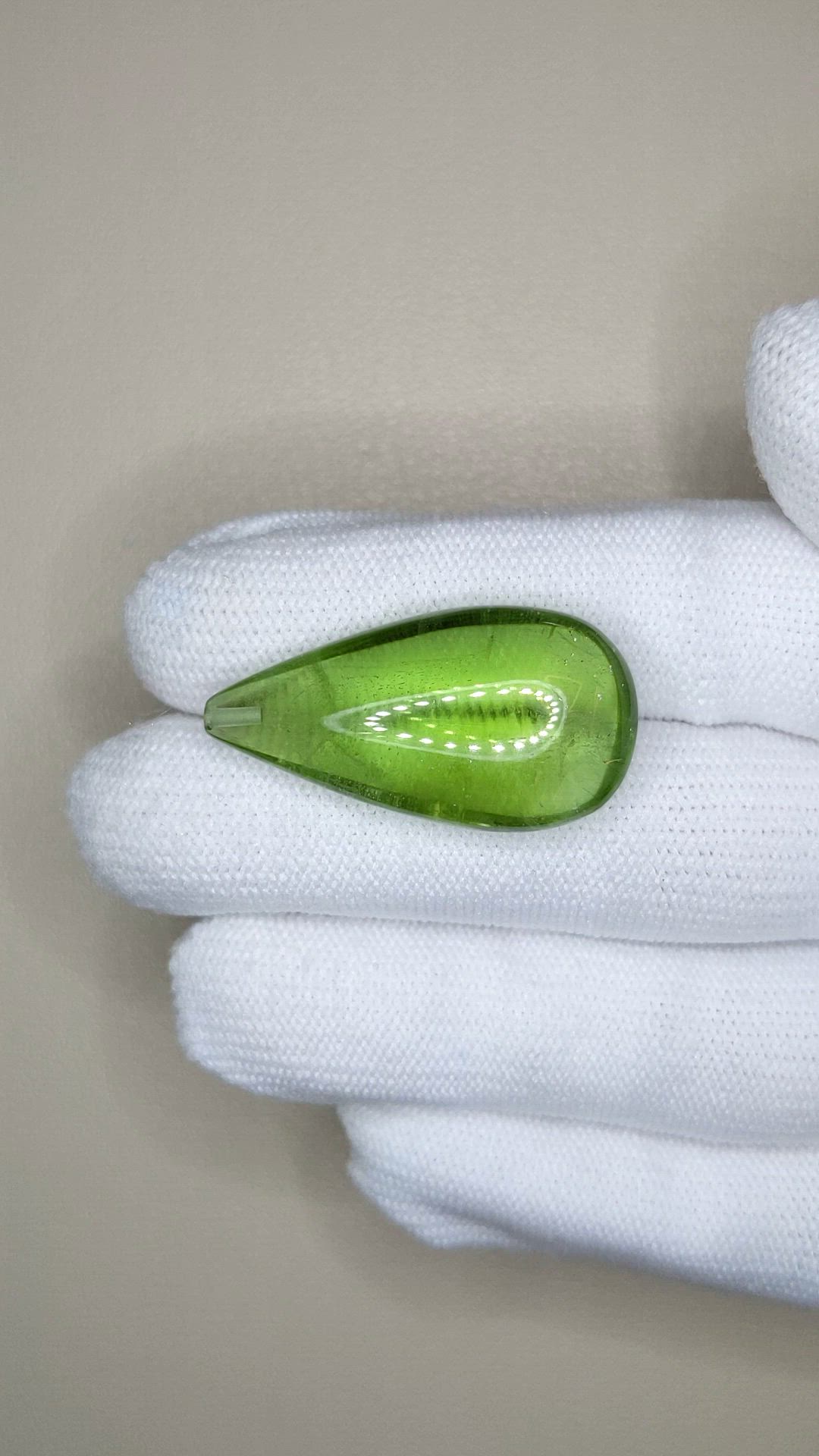 35.62 Ct. Green (Lime Green) Peridot from Burma (Myanmar) Size Video