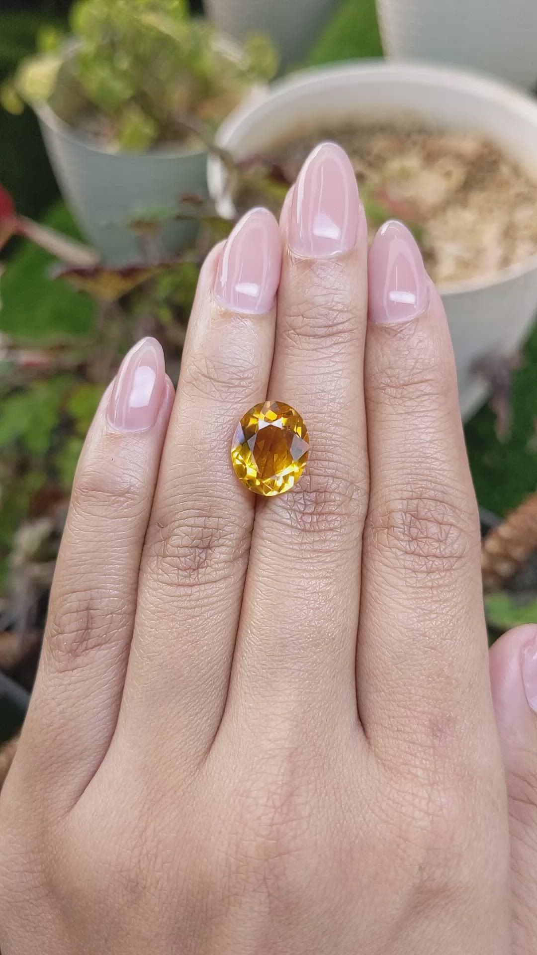 5.56 Ct. Orangish Yellow Citrine from Brazil Size Video