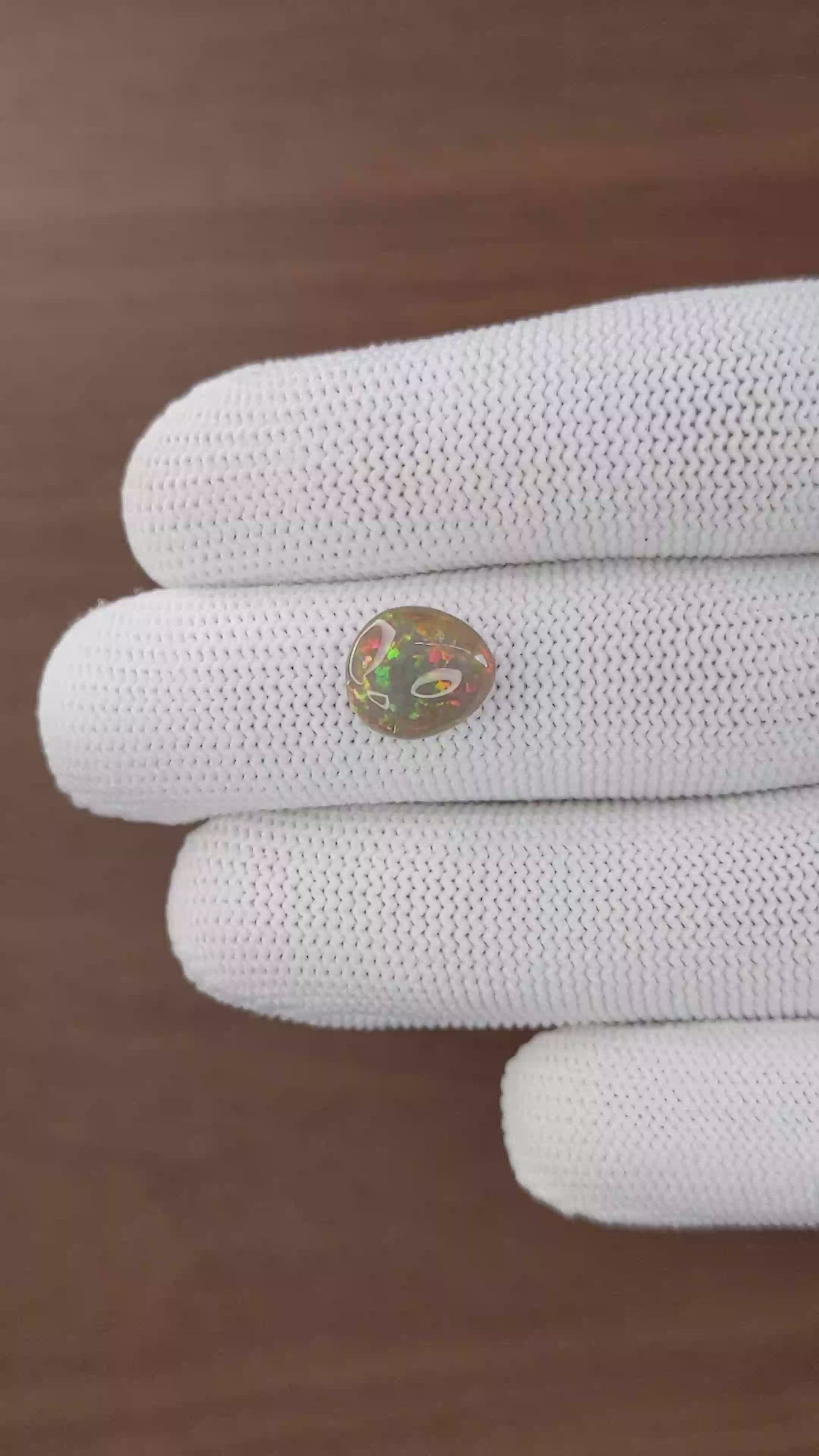 2.77 Ct. Multi Color Cabochon White Opal (Light Opal) from Ethiopia Size Video