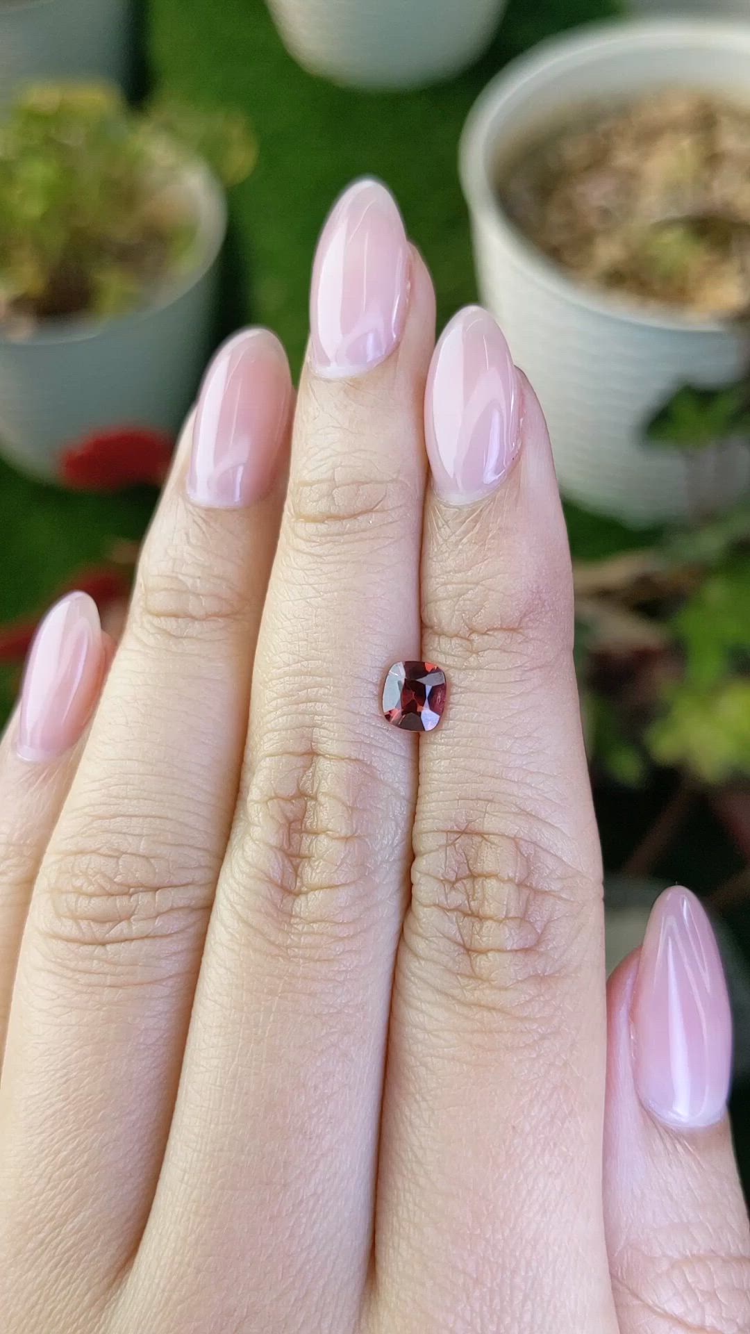 0.82 Ct. Orangish Red Garnet from Ceylon (Sri Lanka) Size Video