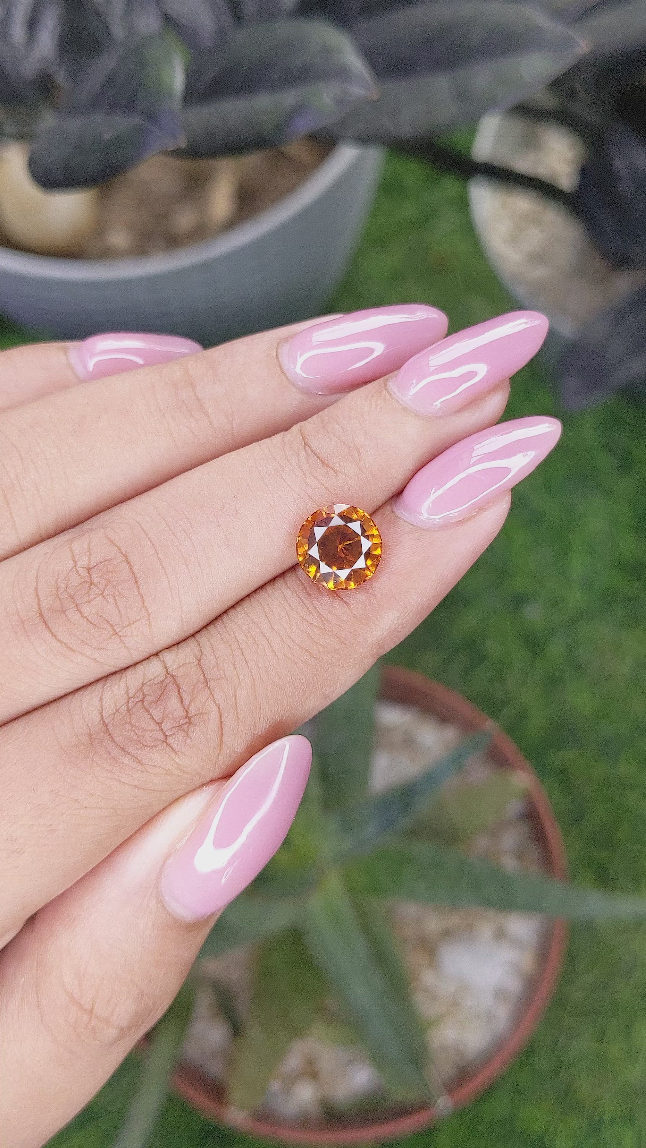 3.29 Ct. Golden Orange Hessonite Garnet Size Video