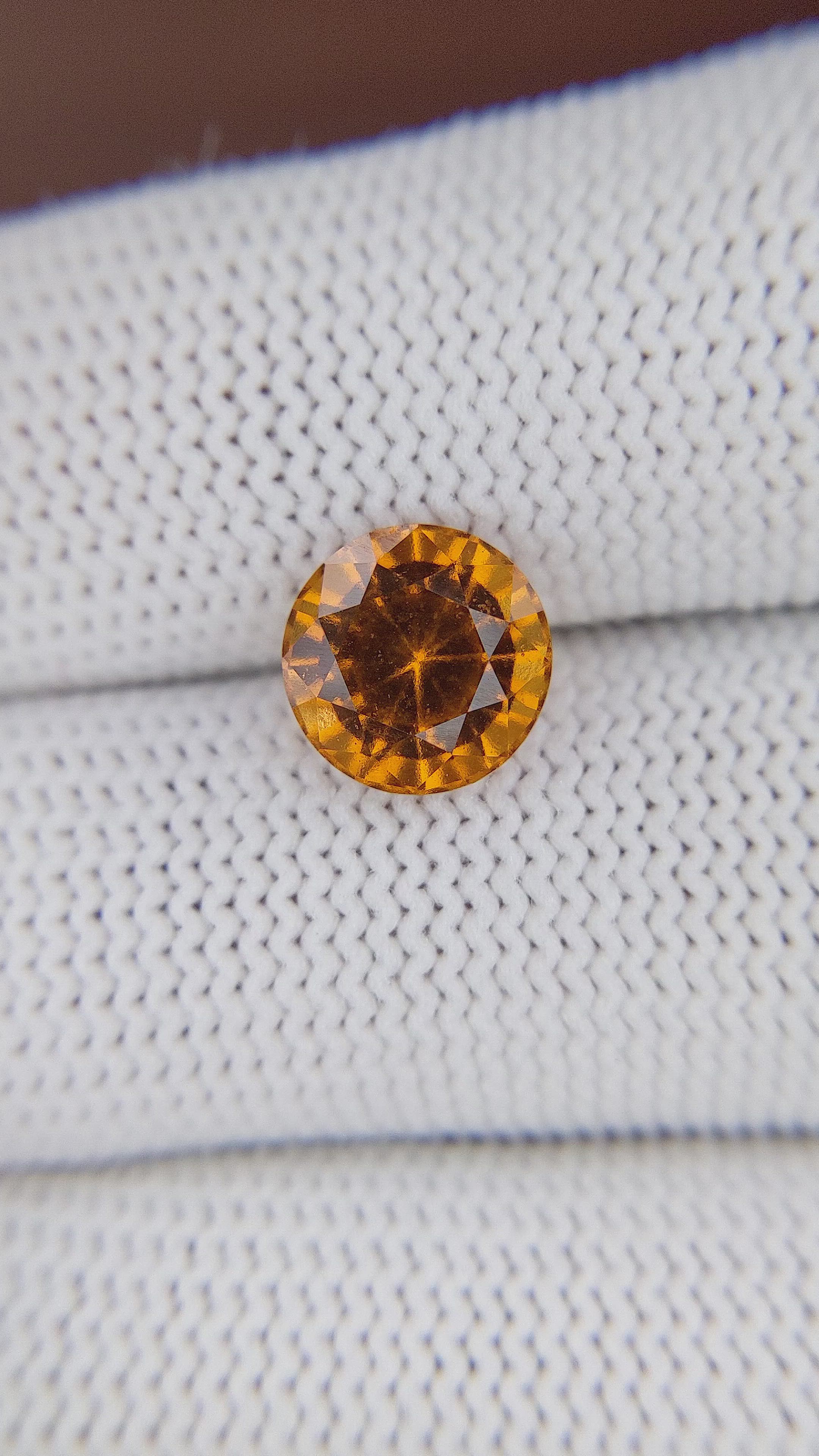 3.29 Ct. Golden Orange Hessonite Garnet Size Video