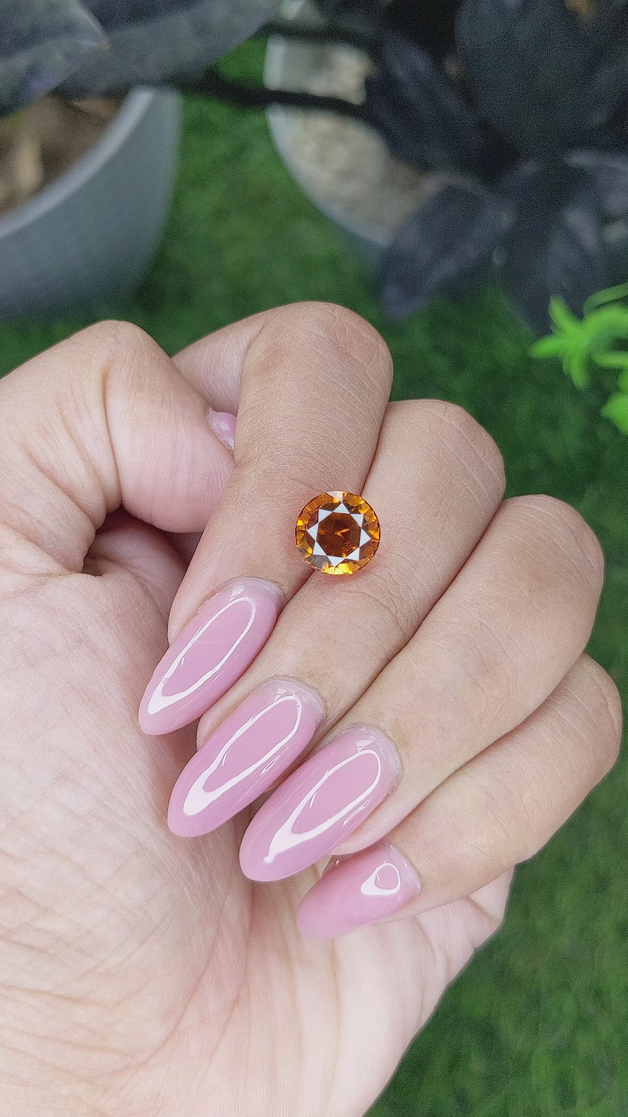 3.29 Ct. Golden Orange Hessonite Garnet Size Video