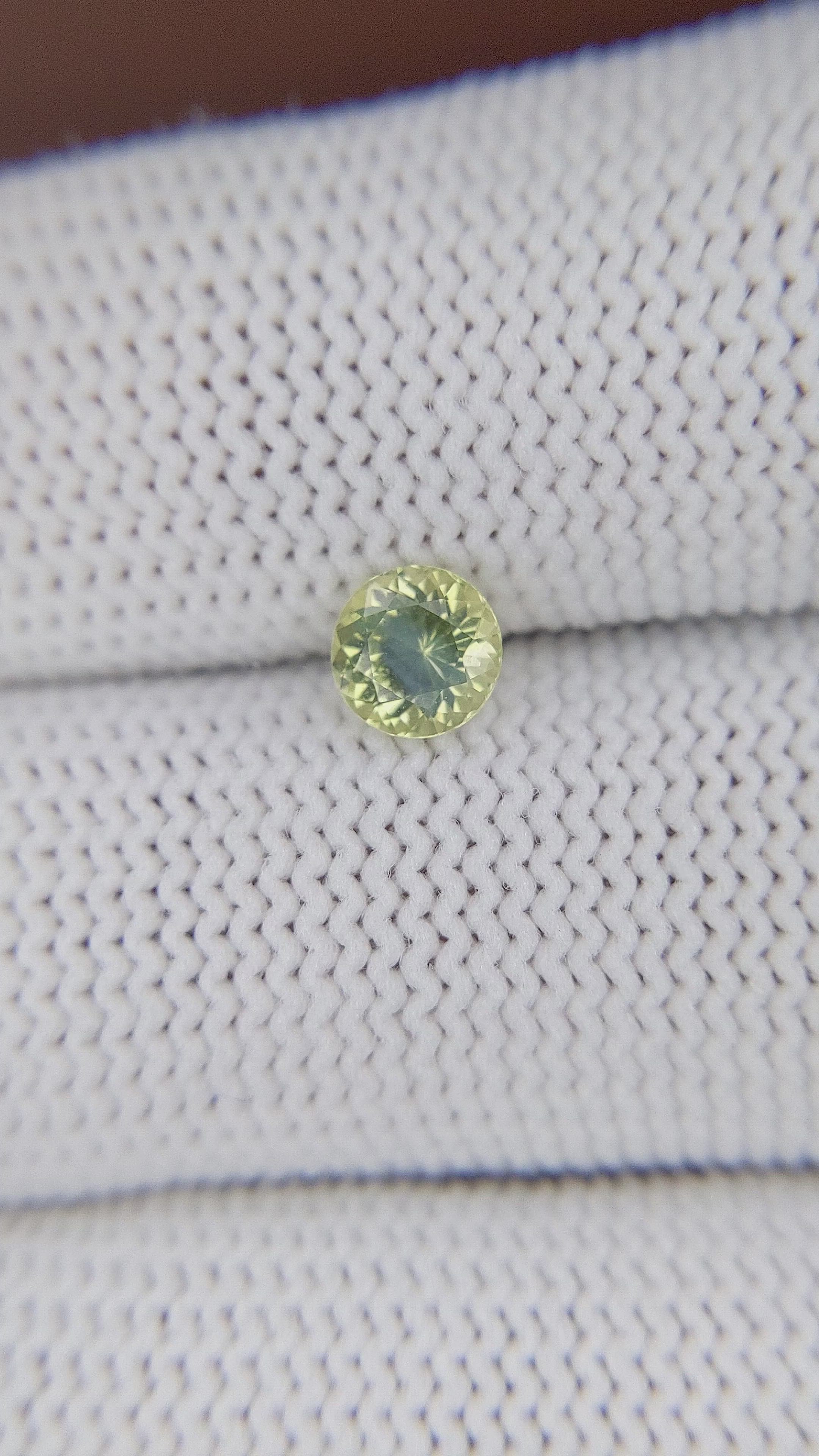 0.68 Ct. Yellowish Green Peridot from Tanzania Size Video