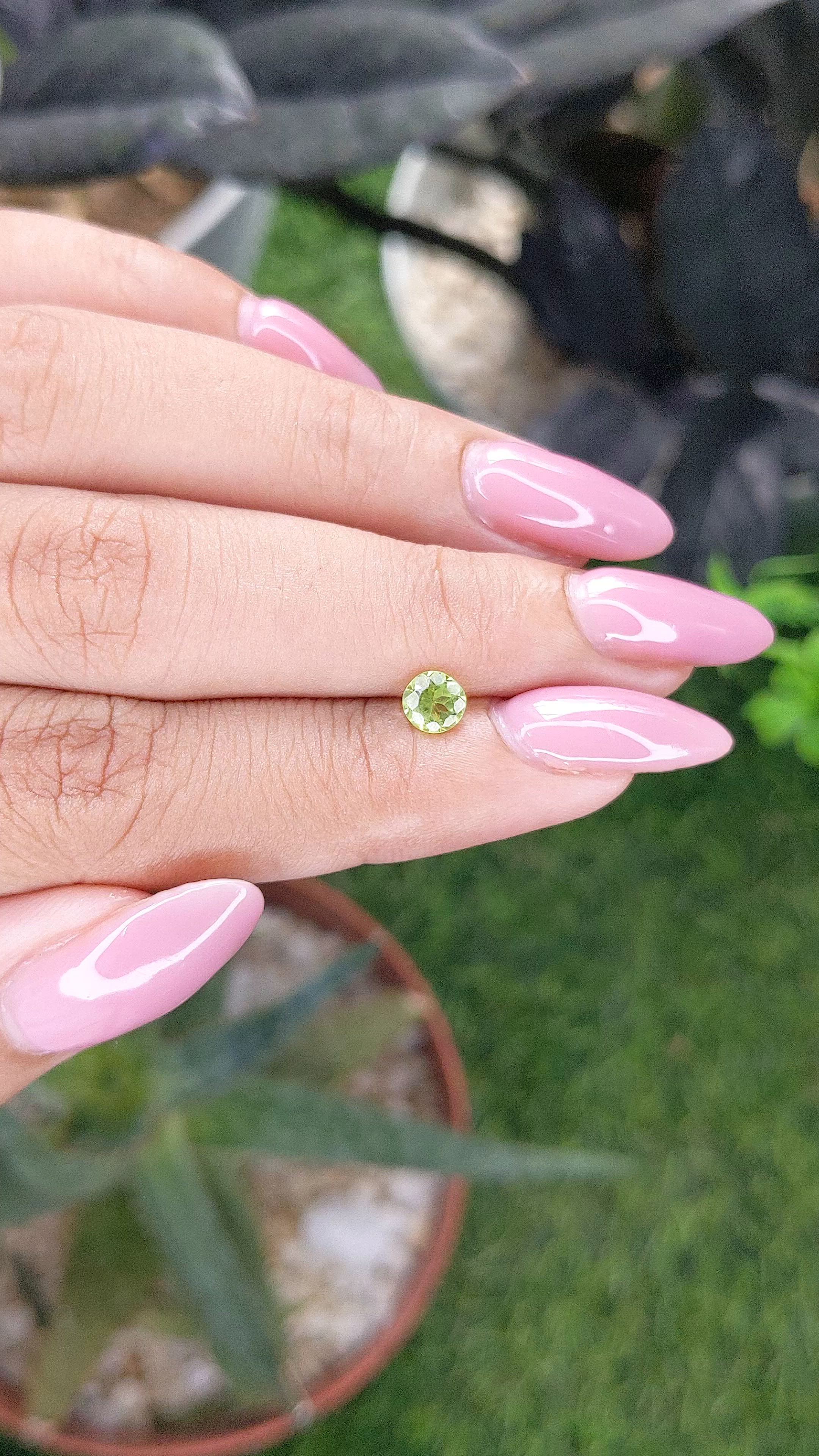 0.50 Ct. Yellowish Green Peridot from Tanzania Size Video