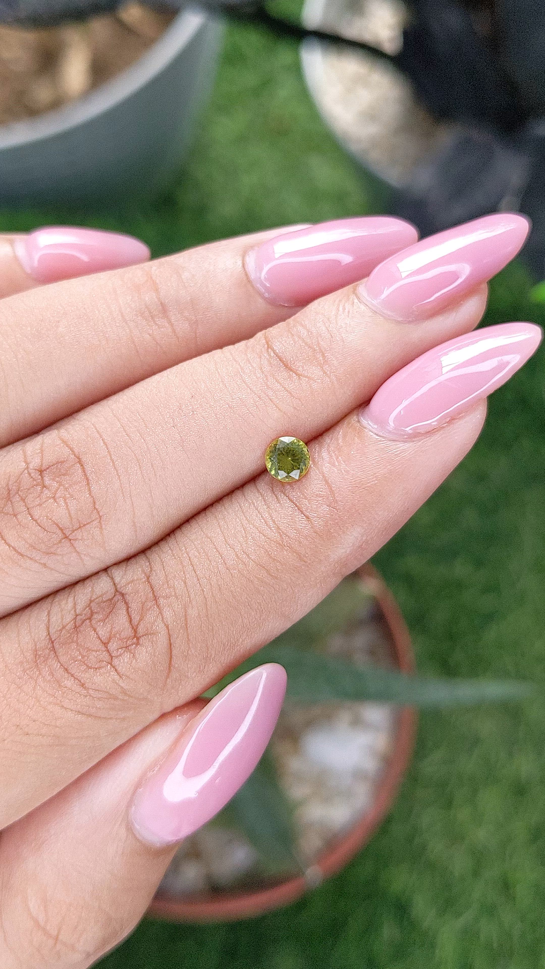 0.32 Ct. Yellowish Green Peridot from Tanzania Size Video