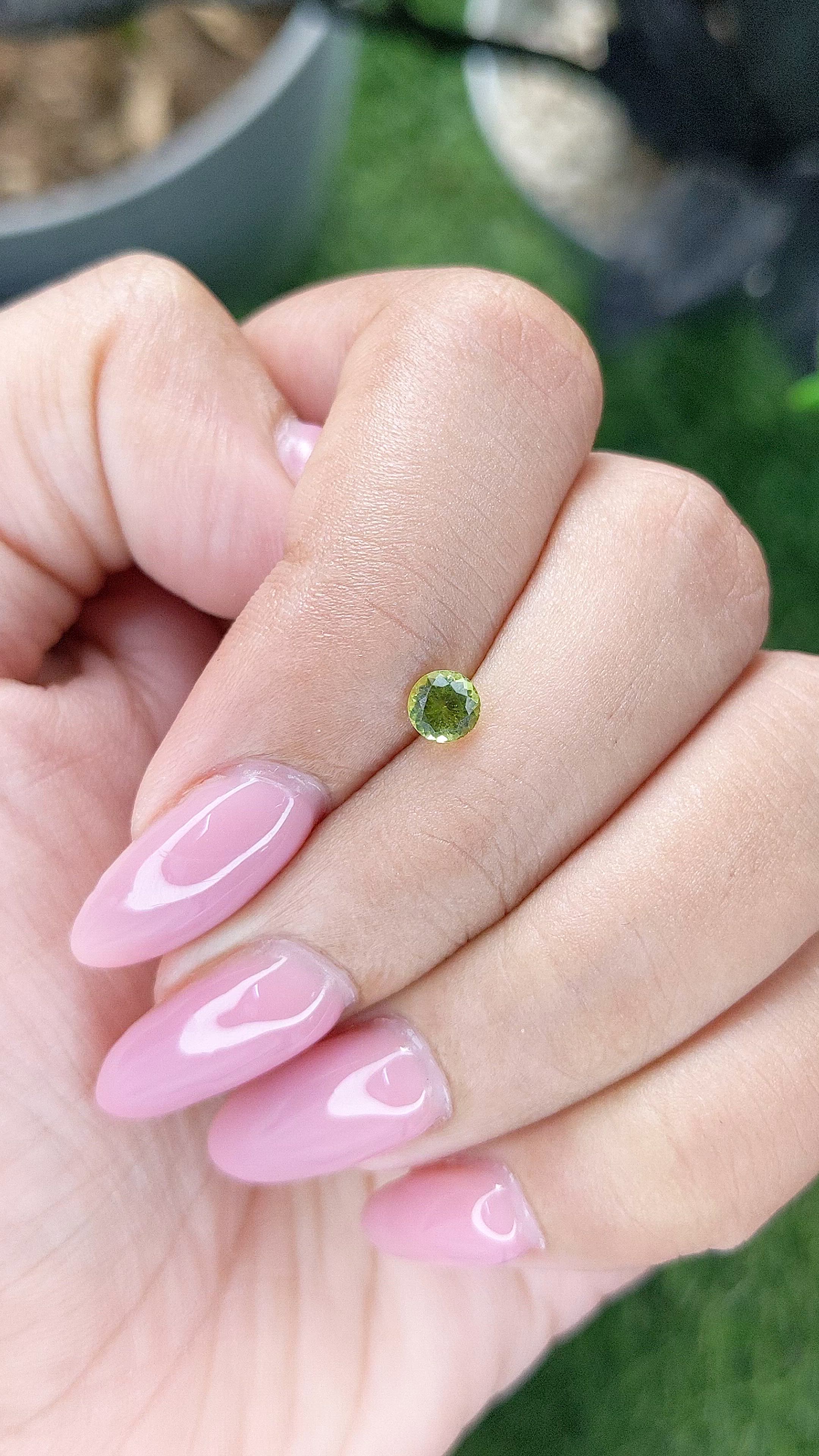 0.32 Ct. Yellowish Green Peridot from Tanzania Size Video