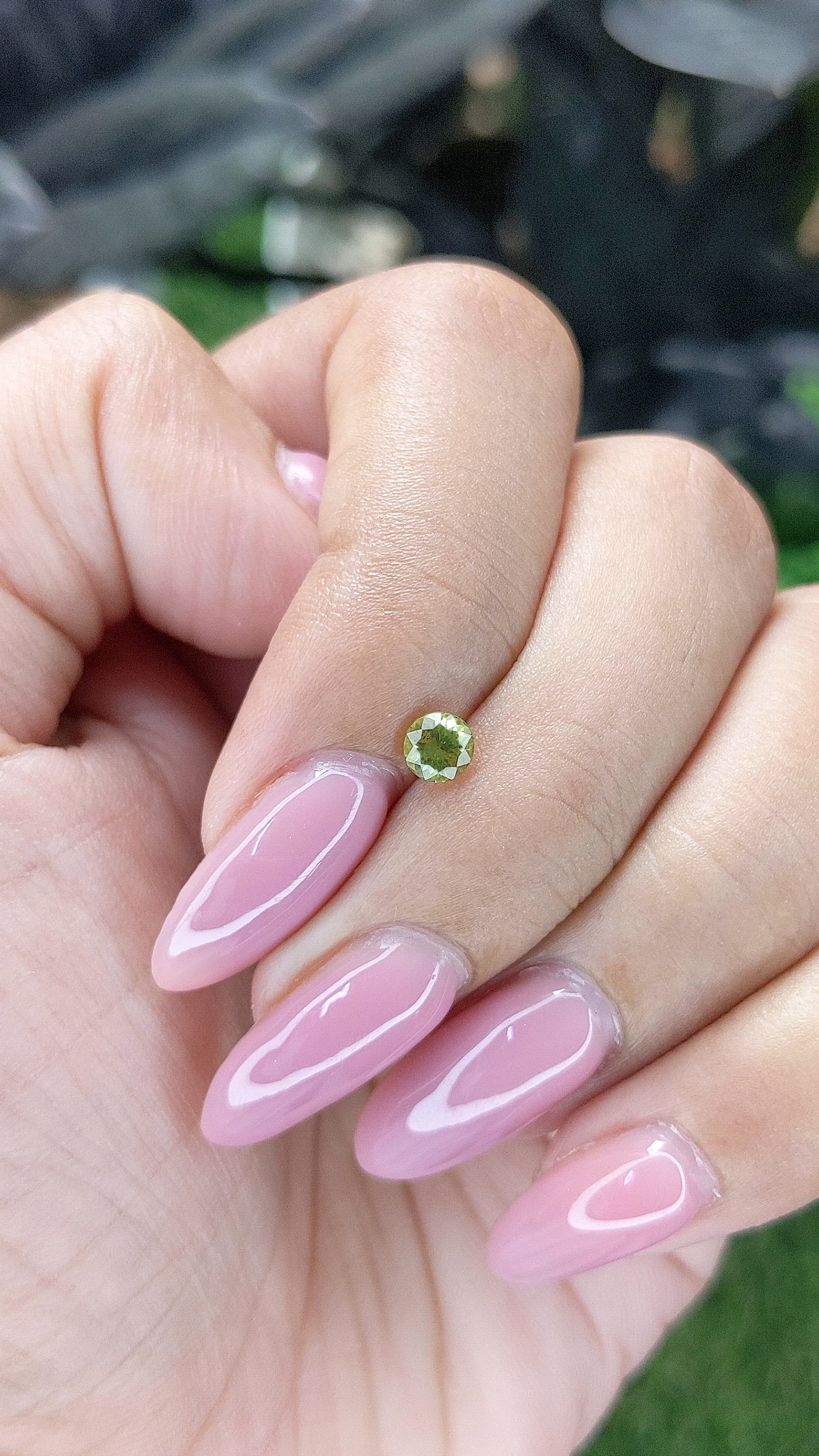 0.33 Ct. Yellowish Green Peridot from Tanzania Size Video