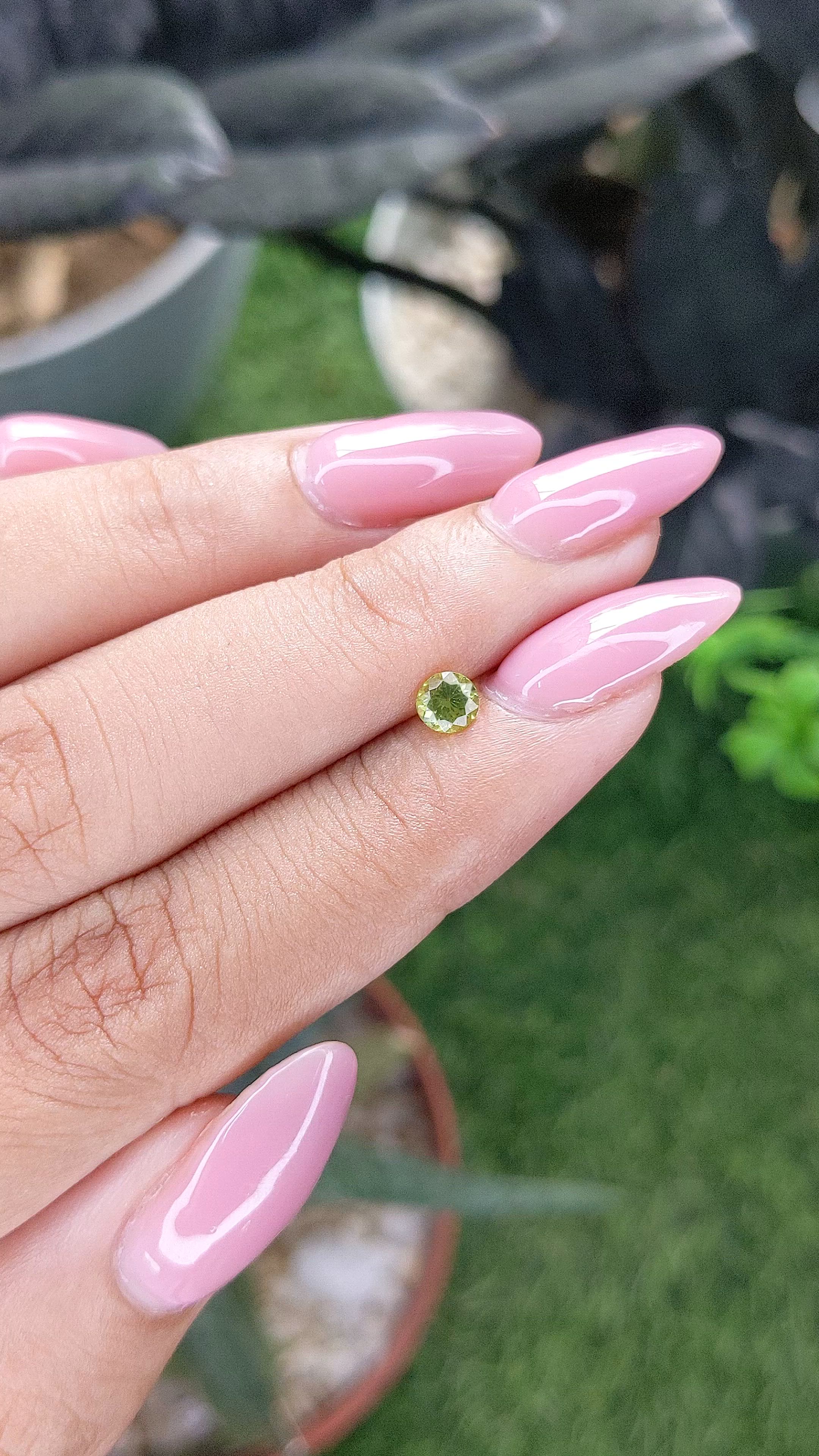0.33 Ct. Yellowish Green Peridot from Tanzania Size Video