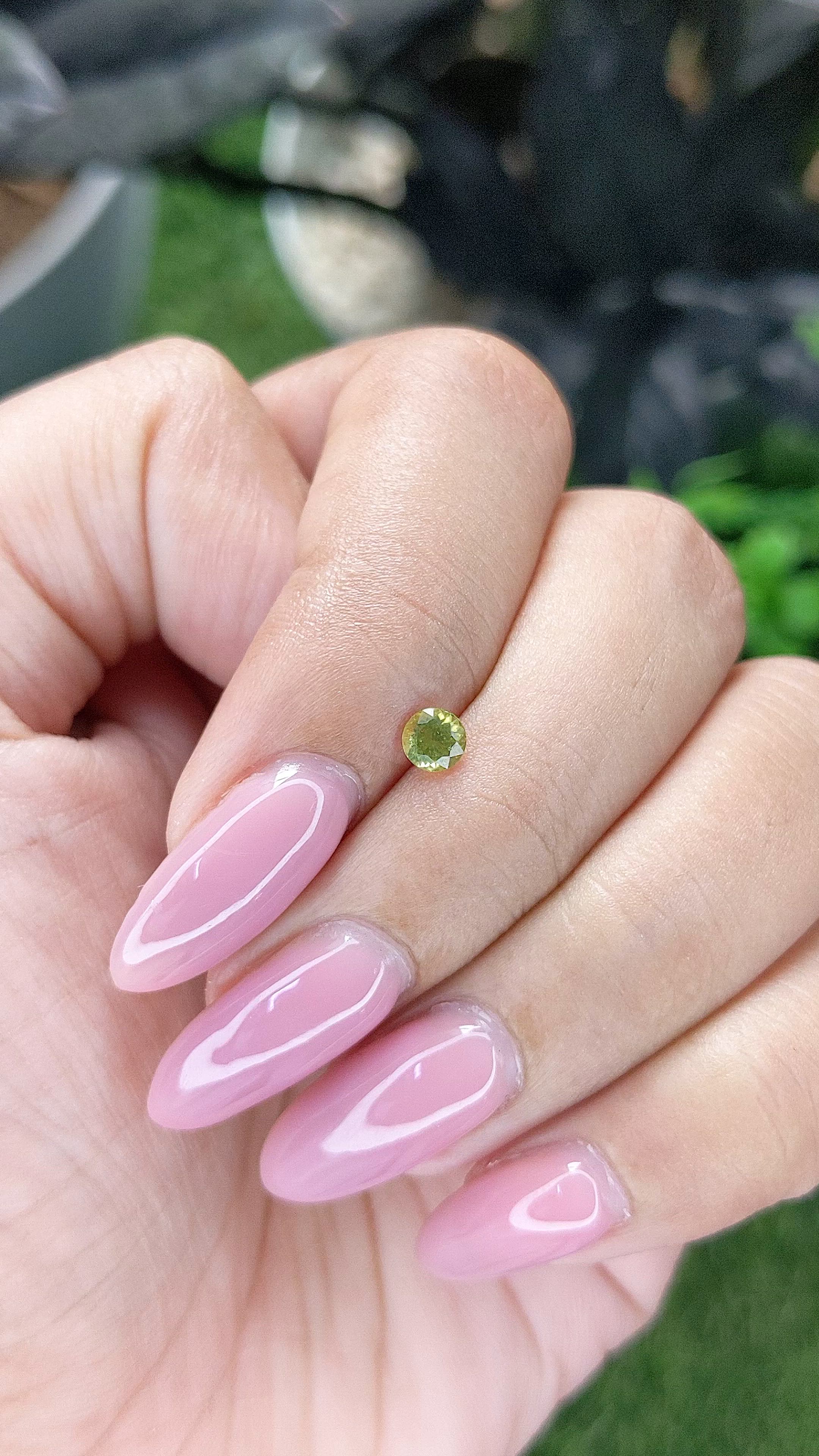 0.27 Ct. Yellowish Green Peridot from Tanzania Size Video